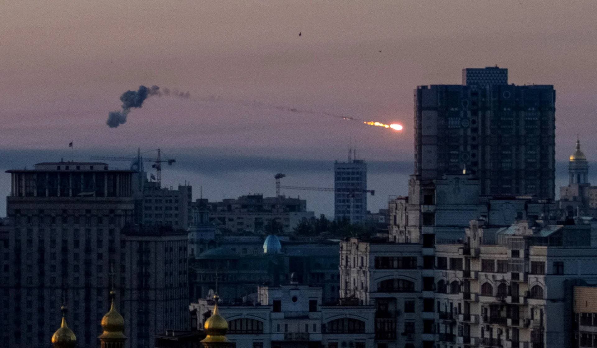 An explosion of a missile in the sky over the city during a Russian missile strike in Kyiv