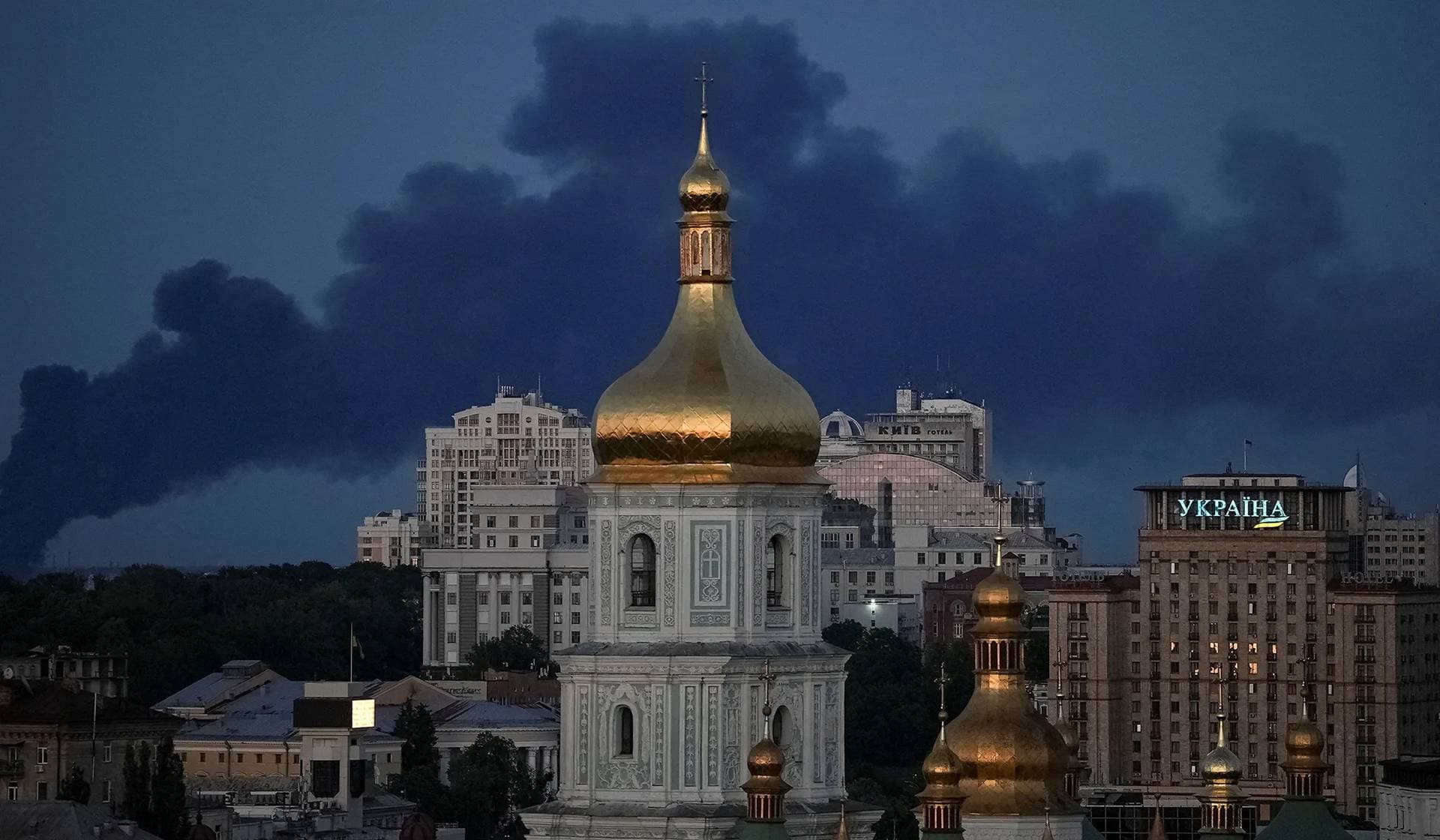 Smoke rises in the city during a Russian missile strike in Kyiv