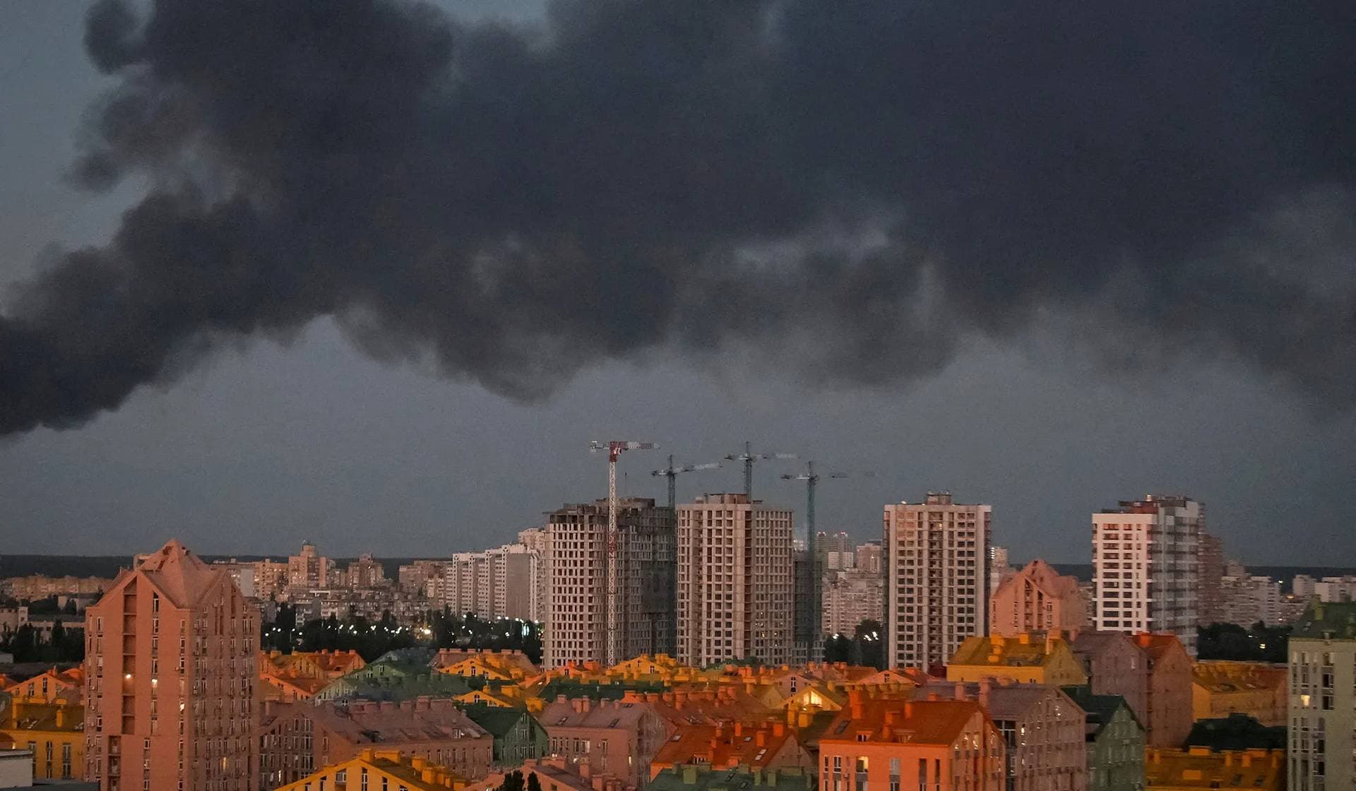 Smoke rises in the city during a Russian missile strike in Kyiv