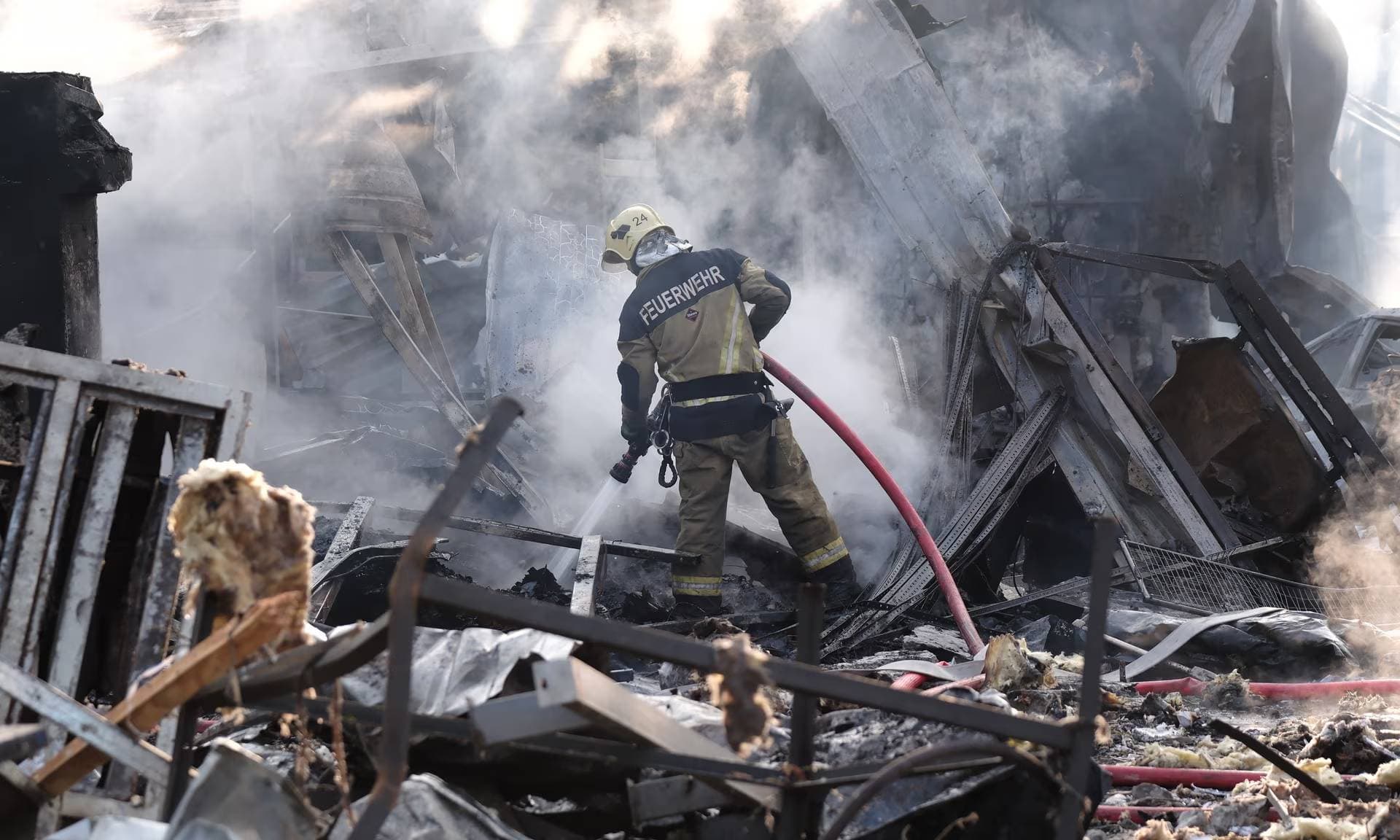 Rescuers put out fires in Darnytskyi district of the city on 21 September 2023 in Kyiv