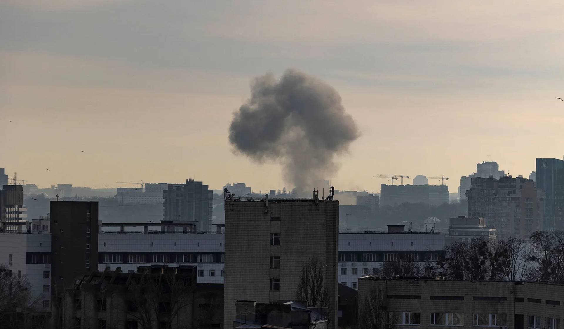 Smoke rises after a Russian missile strike in Kyiv