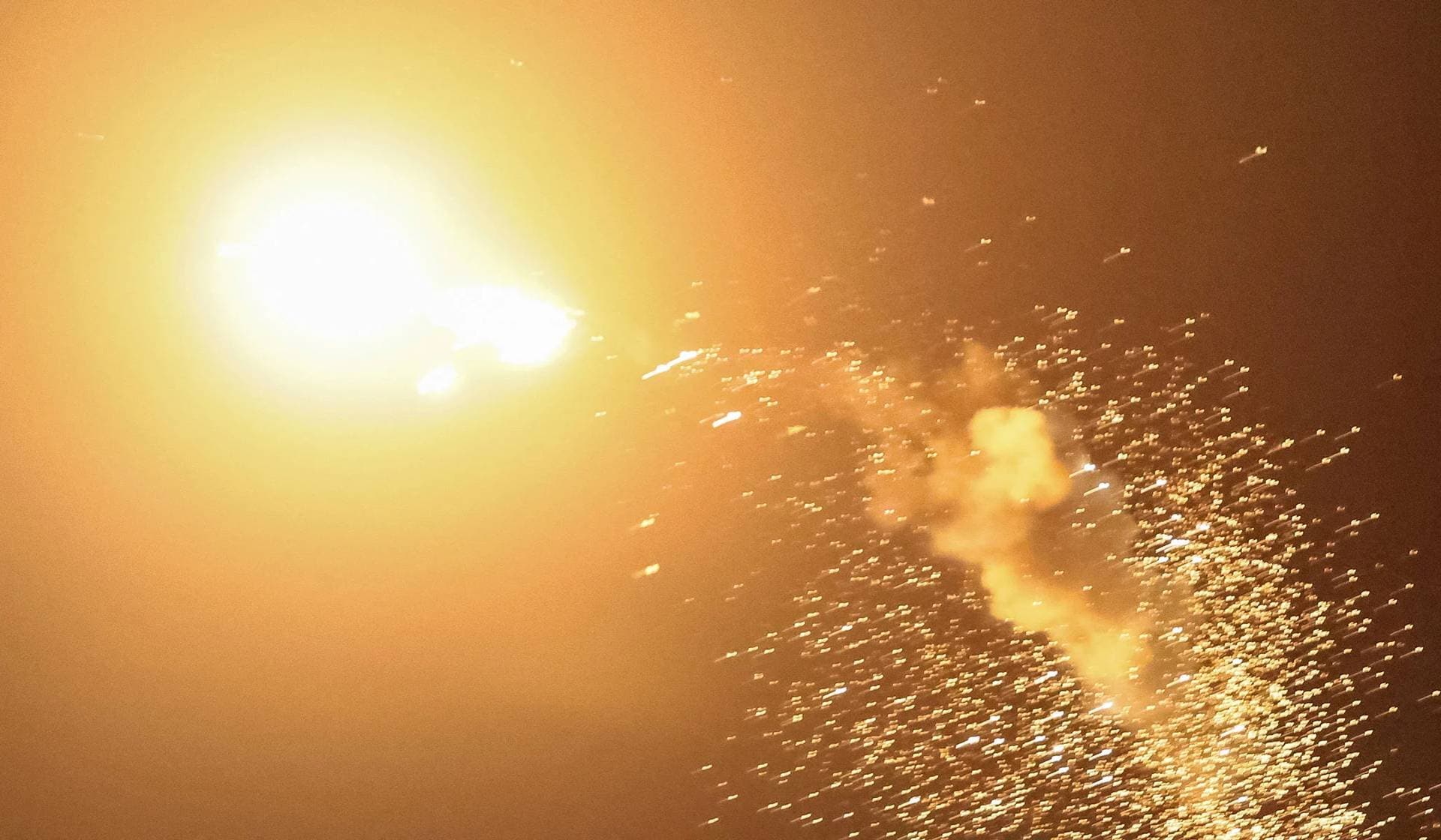Explosion of a drone in the sky over the city during a Russian drone strike in Kyiv