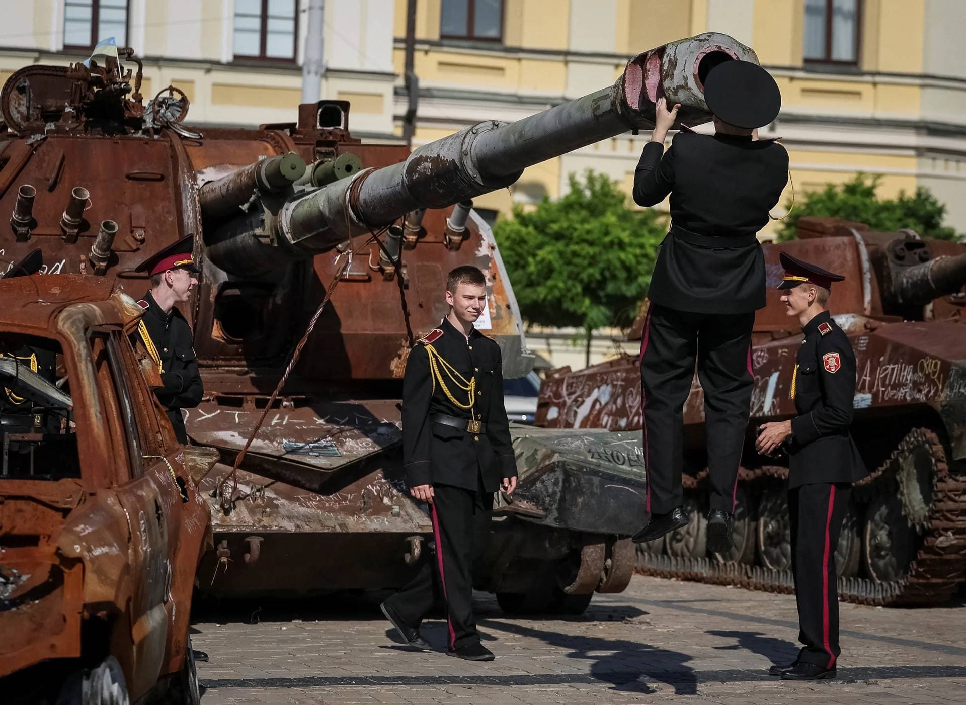 Young Ukrainian military cadets visit an exhibition displaying destroyed Russian armour in Kyiv