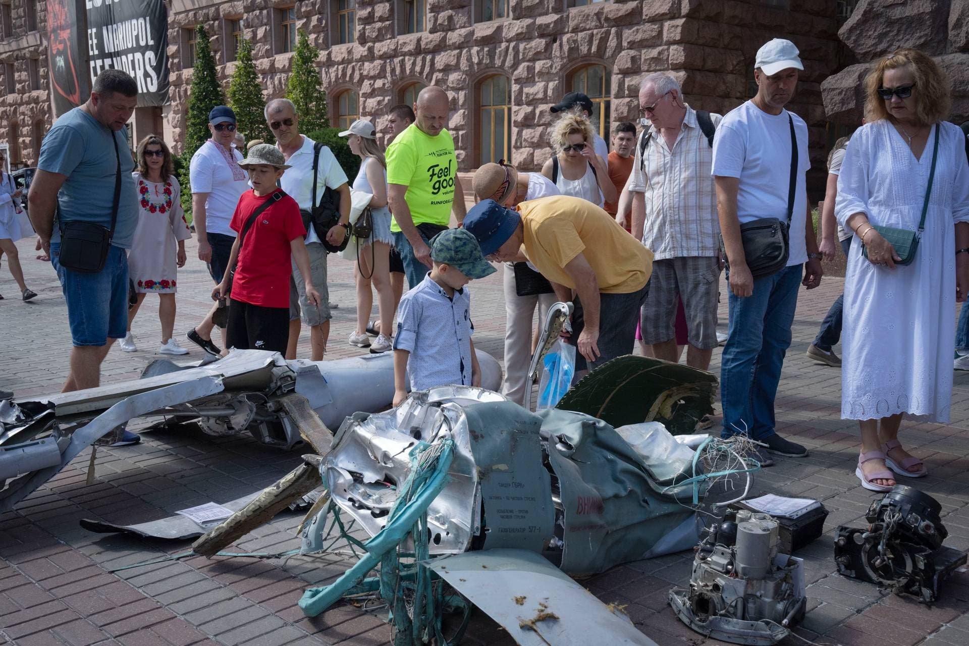 People look at fragments of Russian rockets in Kyiv