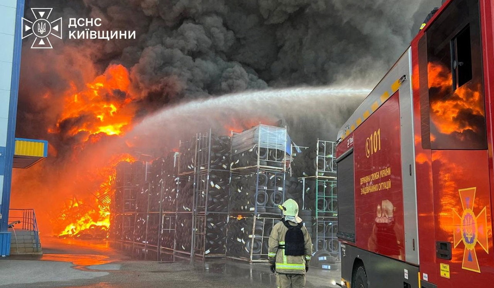 A firefighter works at a site of a Russian drone attack in Kyiv Region