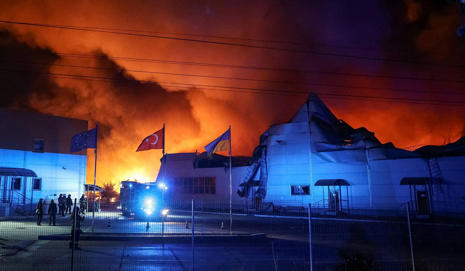 Firefighters work at a site of a Russian missile strike in Kyiv Region