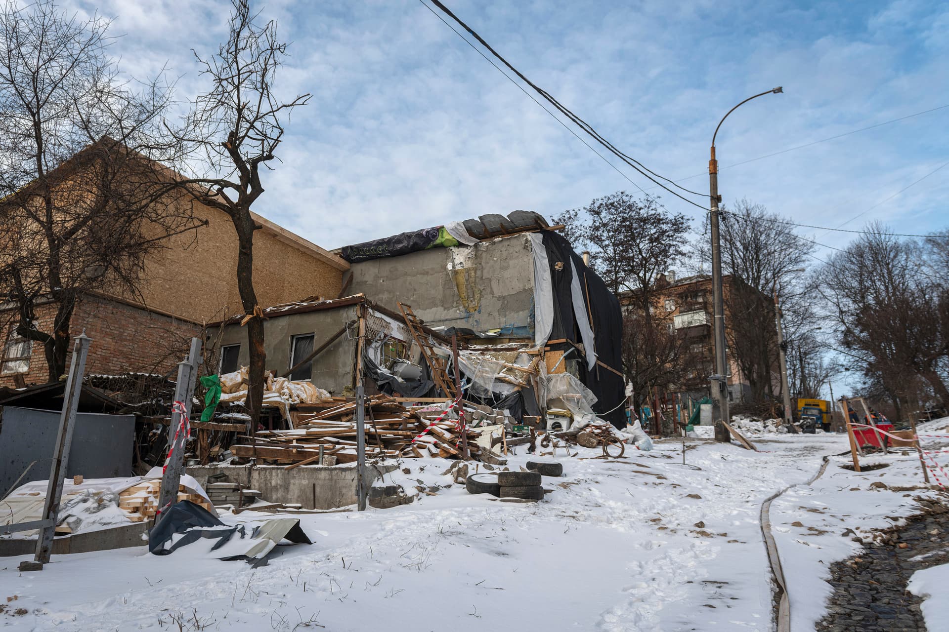 Buildings impacted by Russian missile shelling are seen in Kyiv