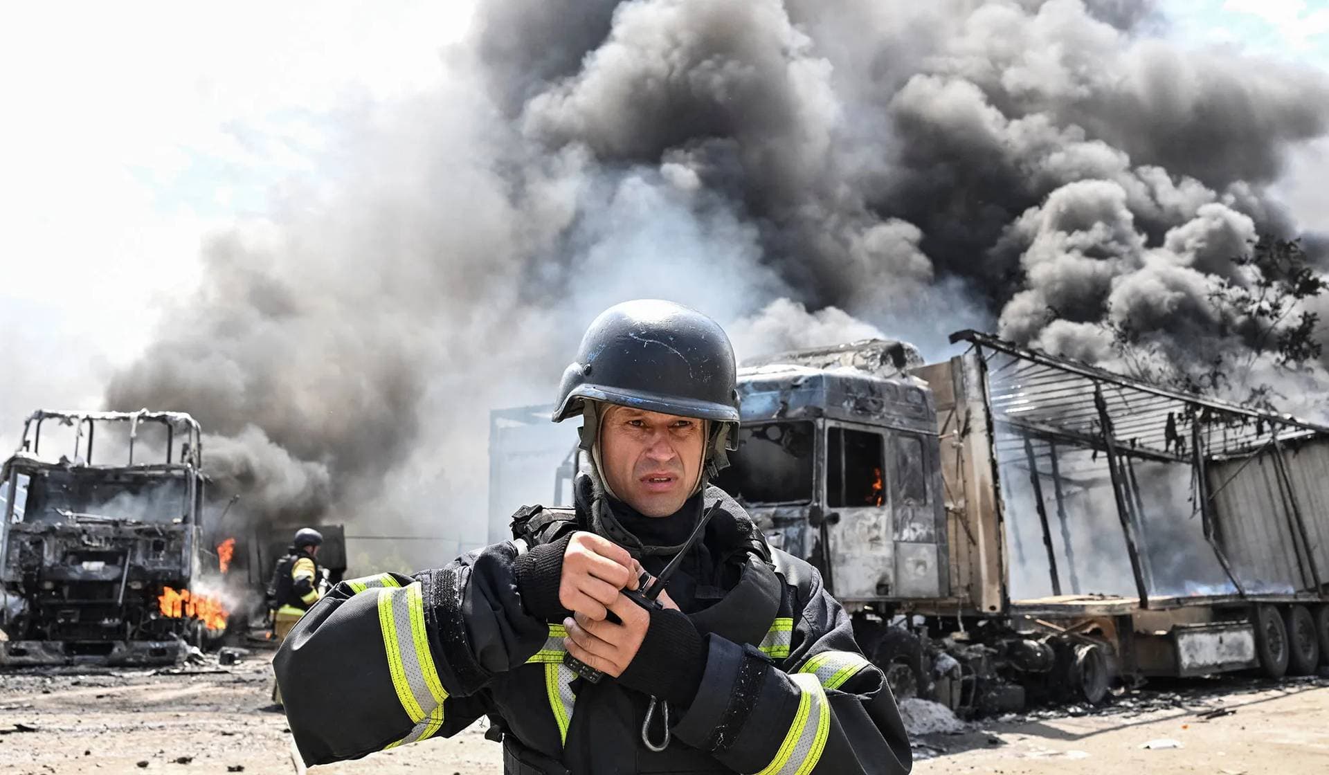 A firefighter works at the site of a Russian drone strike in Zaporizhzhia