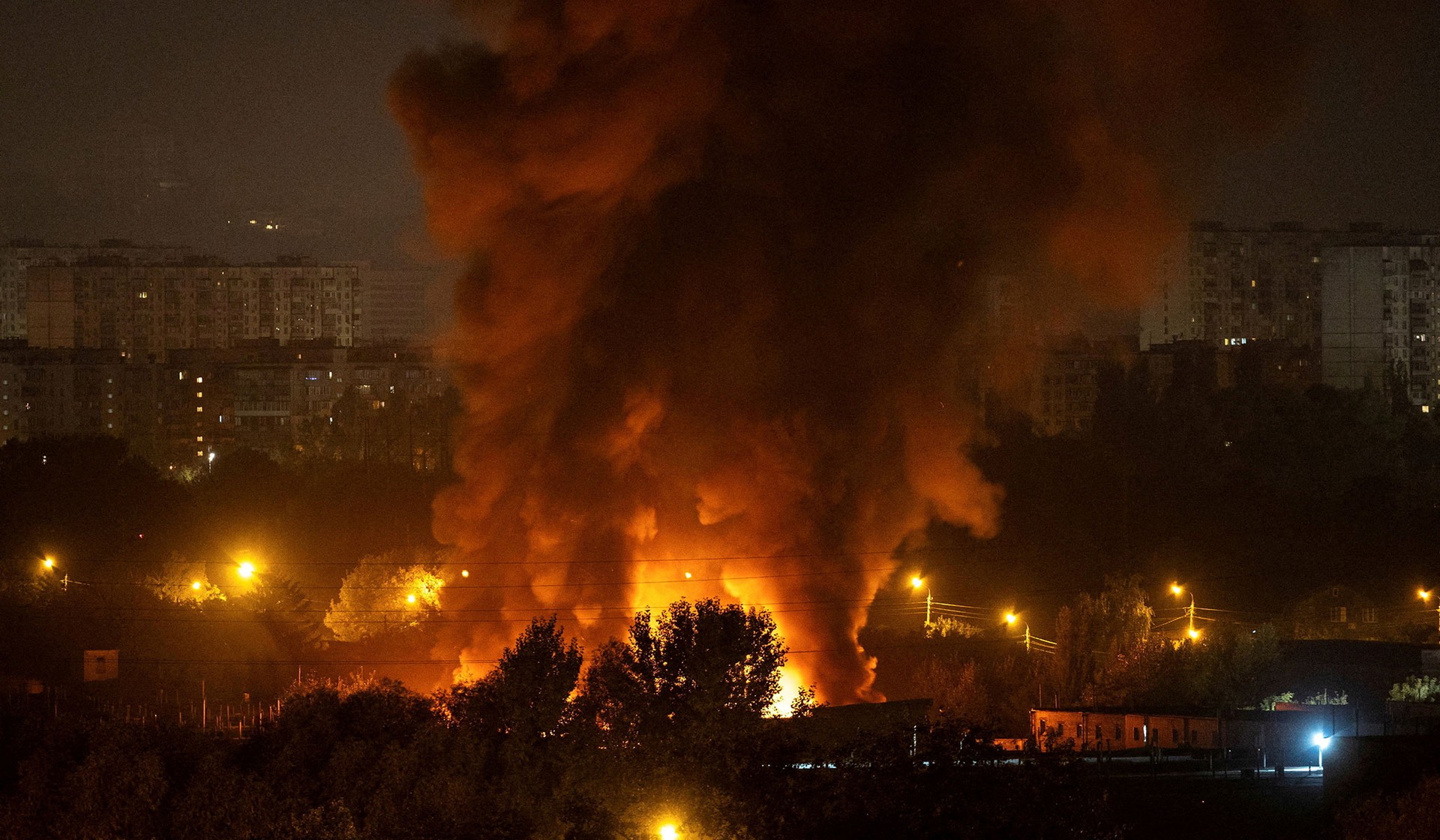 Fire and smoke rise in the city during a Russian missile and drone strike in Kyiv