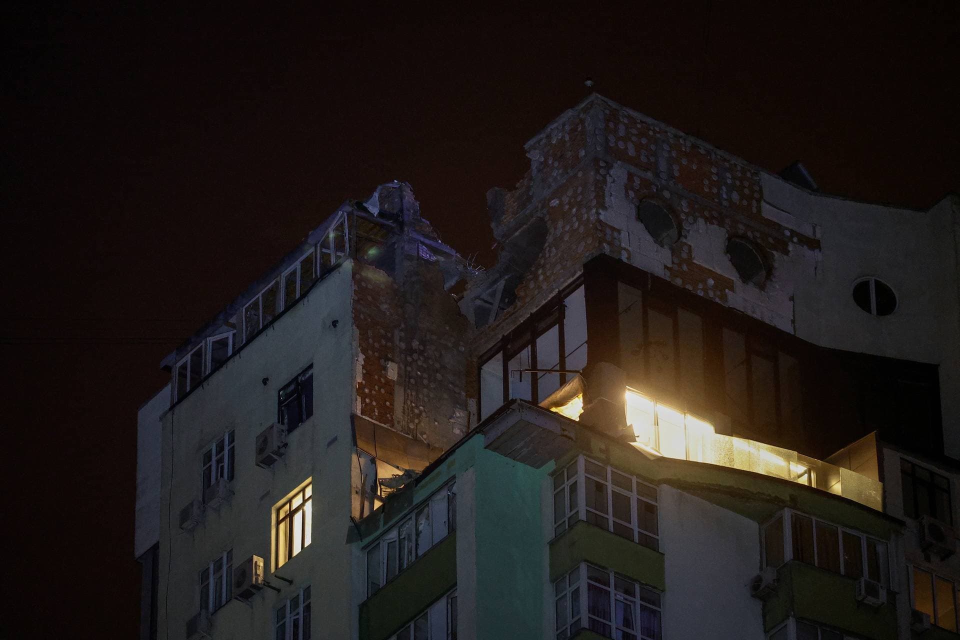 an apartment building damaged during a Russian drone strike in Kyiv