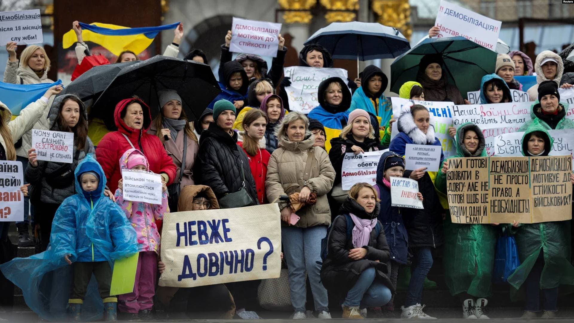 Relatives of Ukrainian soldiers attend a protest calling for legislation regulating the length of active military duty in Kyiv