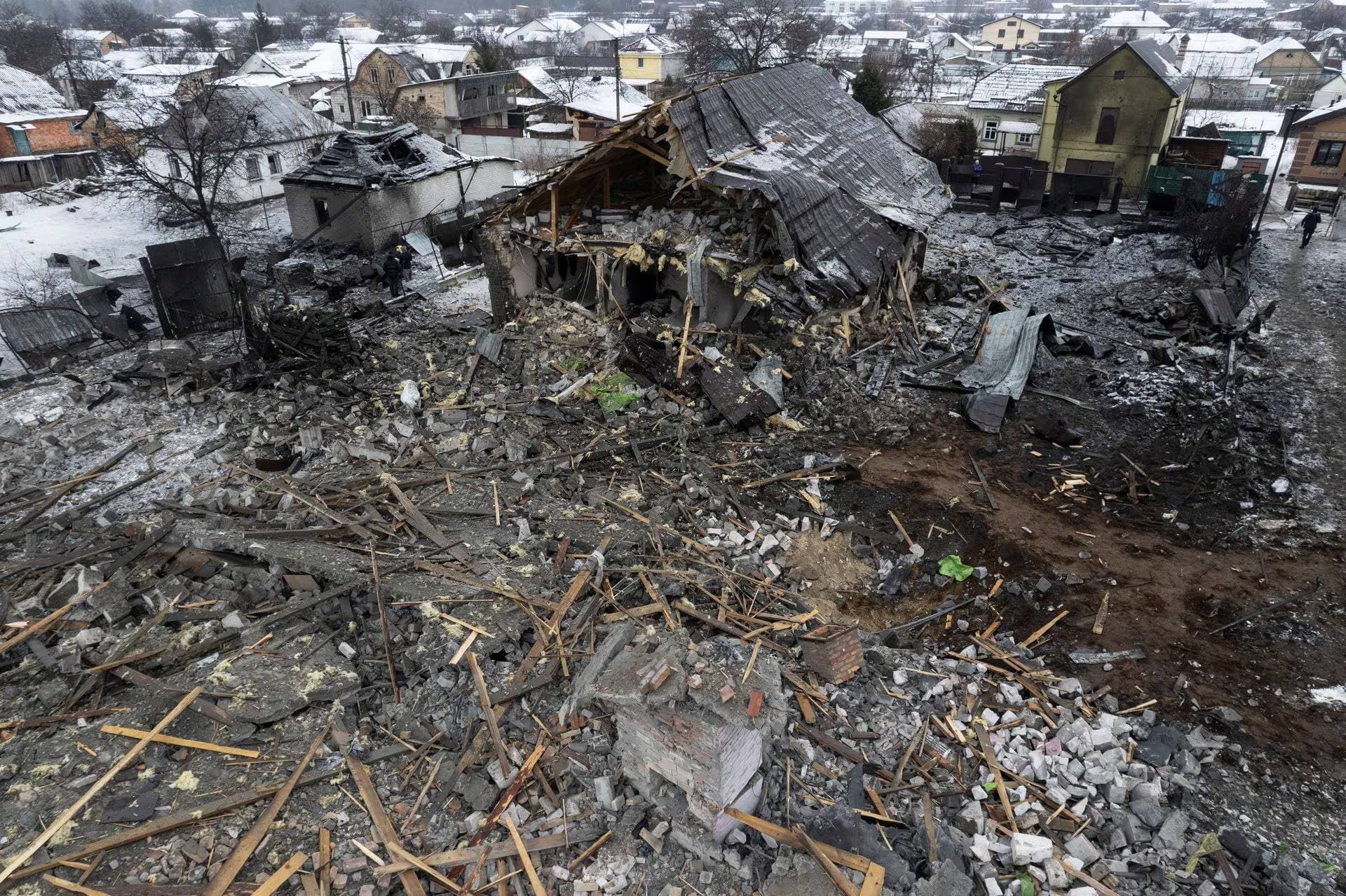 An aerial view shows a site of residential buildings, heavily damaged by a Russian missile strike in Kyiv