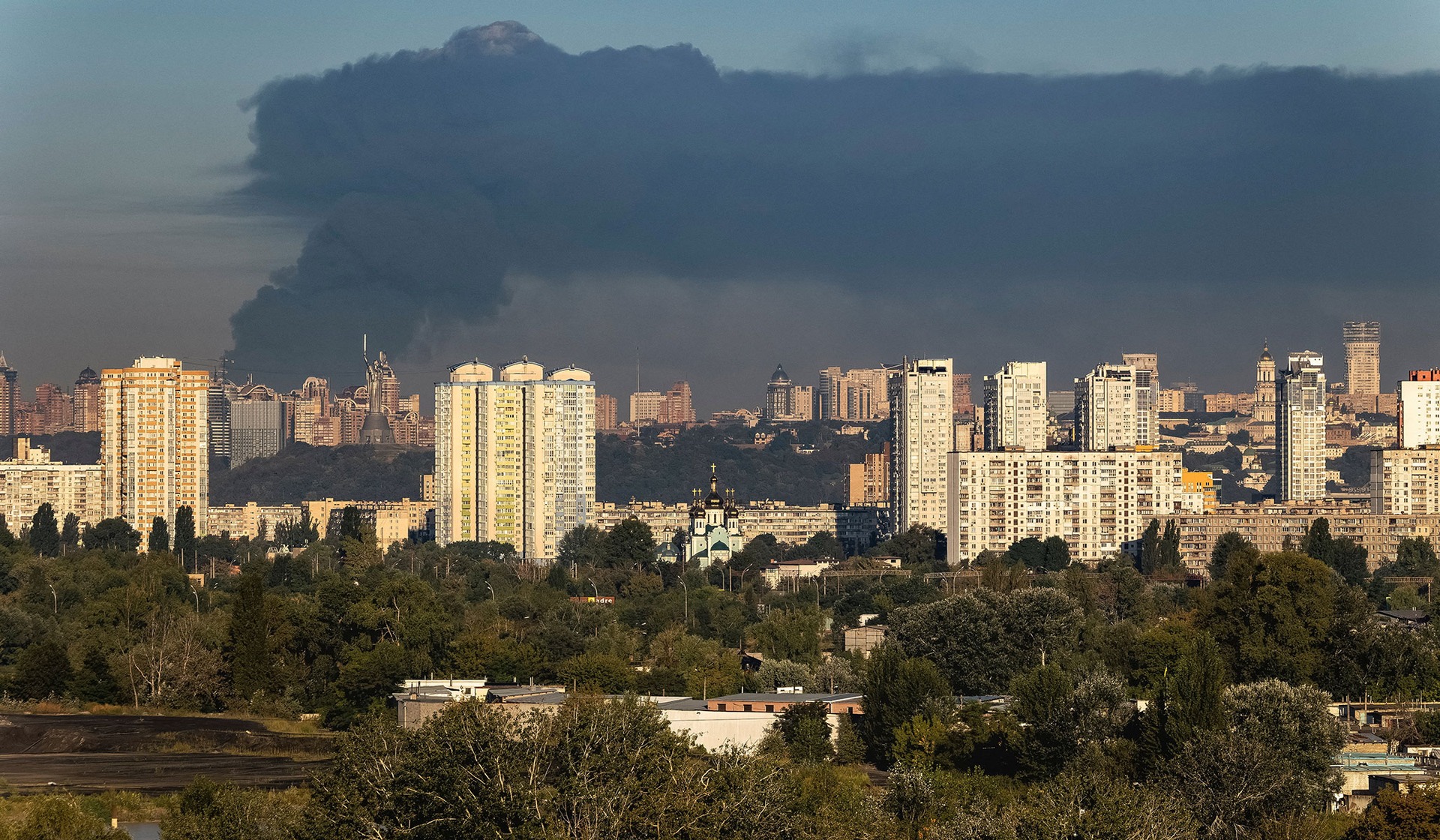 Smoke rises in the city during a Russian drone strike in Kyiv