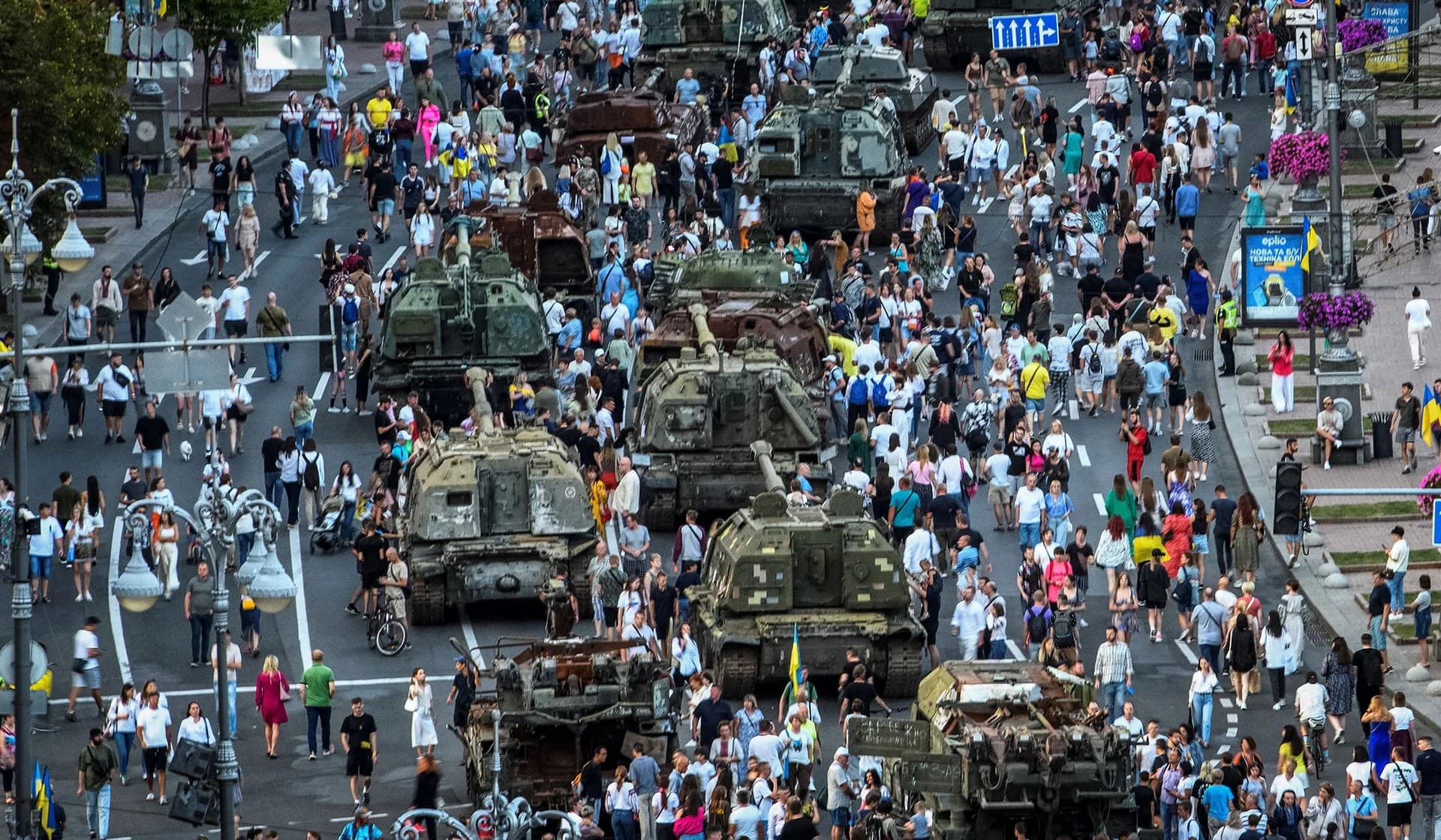 People attend an exhibition displaying destroyed Russian military vehicles on the main street Khreshchatyk as part of the celebration of the Independence Day of Ukraine in central Kyiv