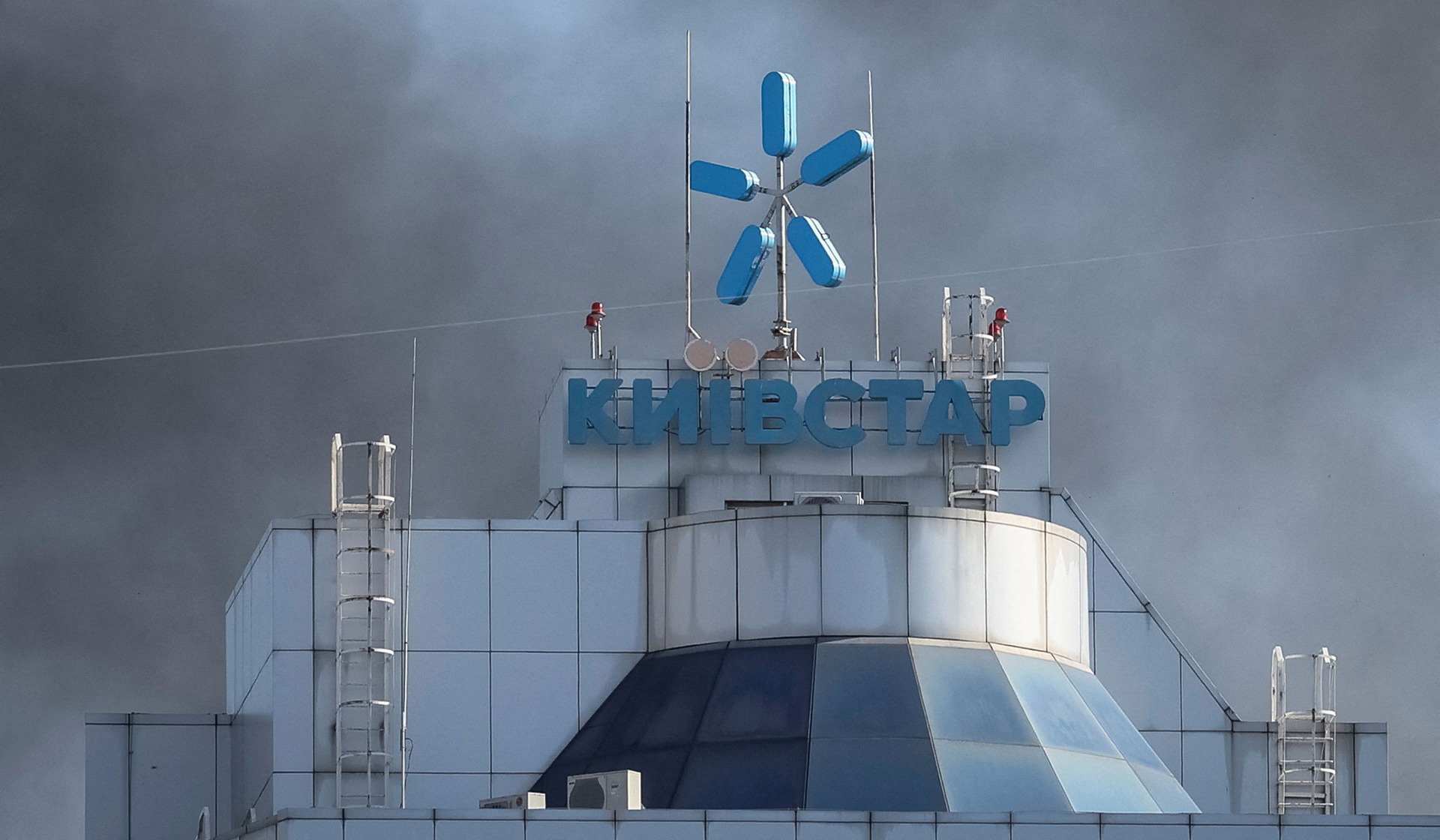 Smoke rises over the headquarters of Kyivstar, one of Ukraine's largest telecoms companies, hit by a Russian jet drone strike in Kyiv