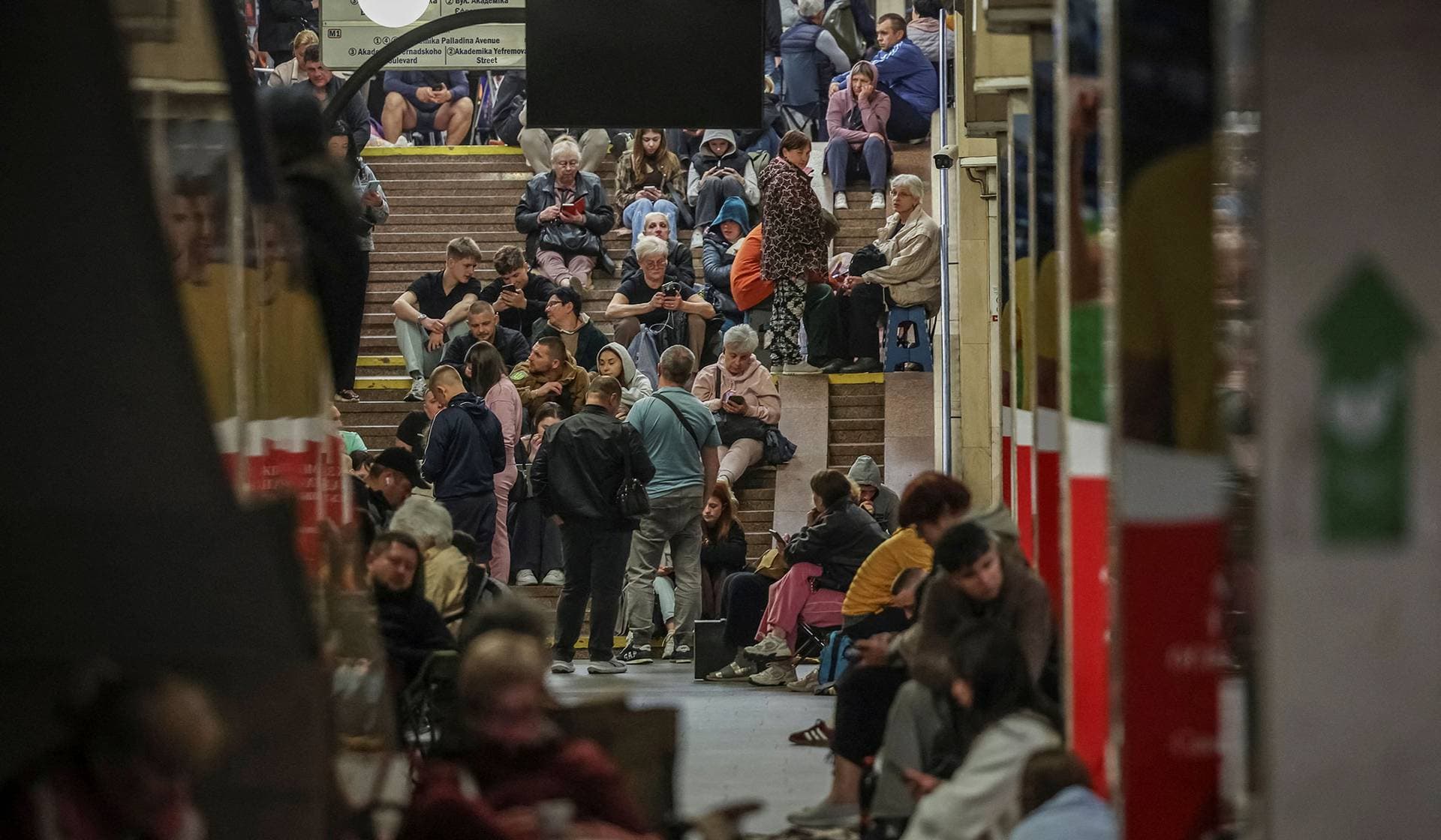 Residents take shelter inside a metro station during a Russian missile and drone strike in Kyiv