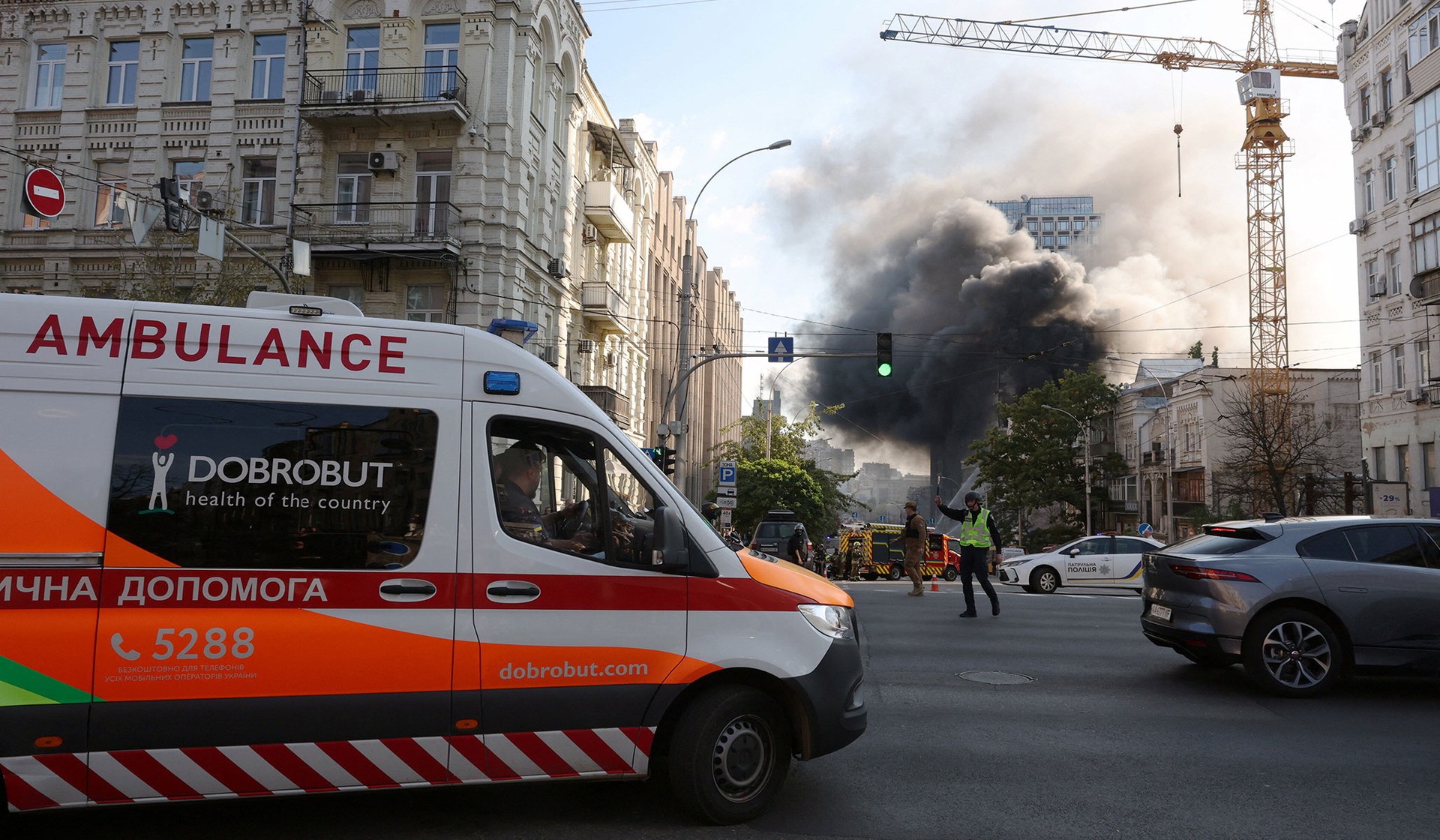Smoke rises from a building in the aftermath of a Russian jet-powered drone strike in Kyiv
