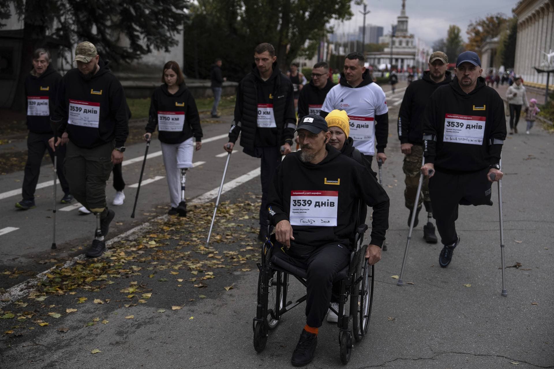 Ukrainian war veterans take part in a charity run in Kyiv