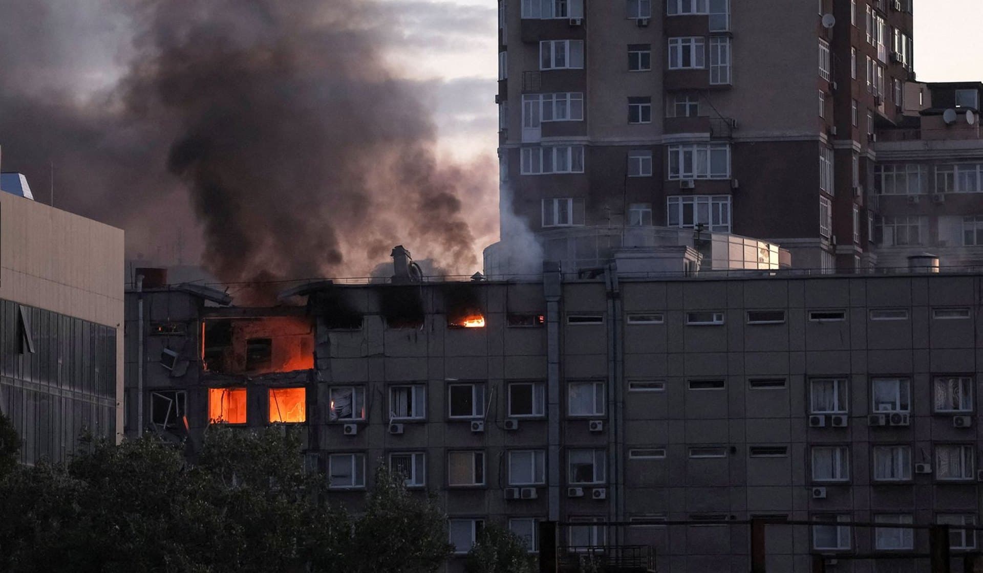 Smoke rises after a Russian drone strike in Kyiv