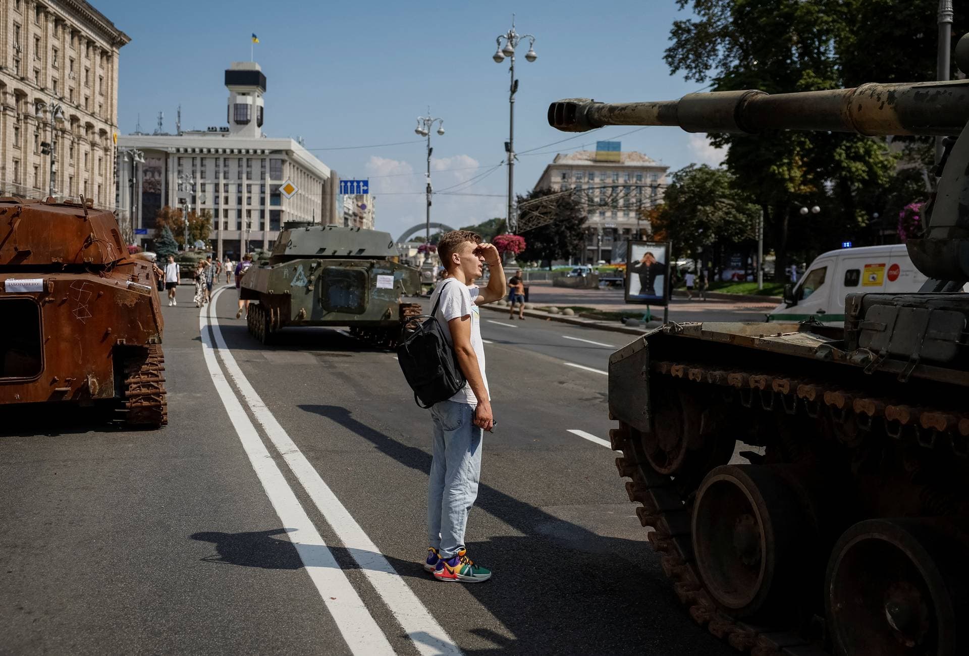 A man looks on as he attends an exhibition displaying destroyed Russian military vehicles located on the main street Khreshchatyk in central Kyiv