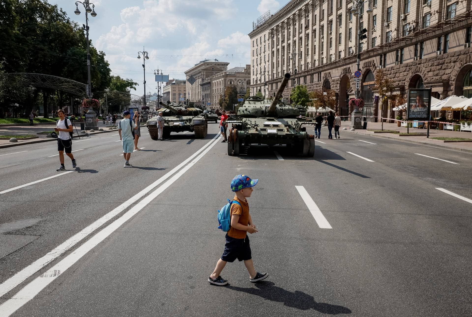 People attend an exhibition displaying destroyed Russian military vehicles in central Kyiv