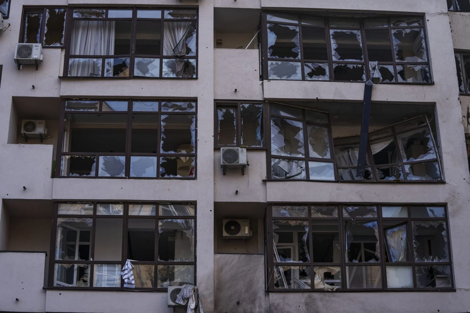 Damage at the scene of a residential building following explosions, in Kyiv
