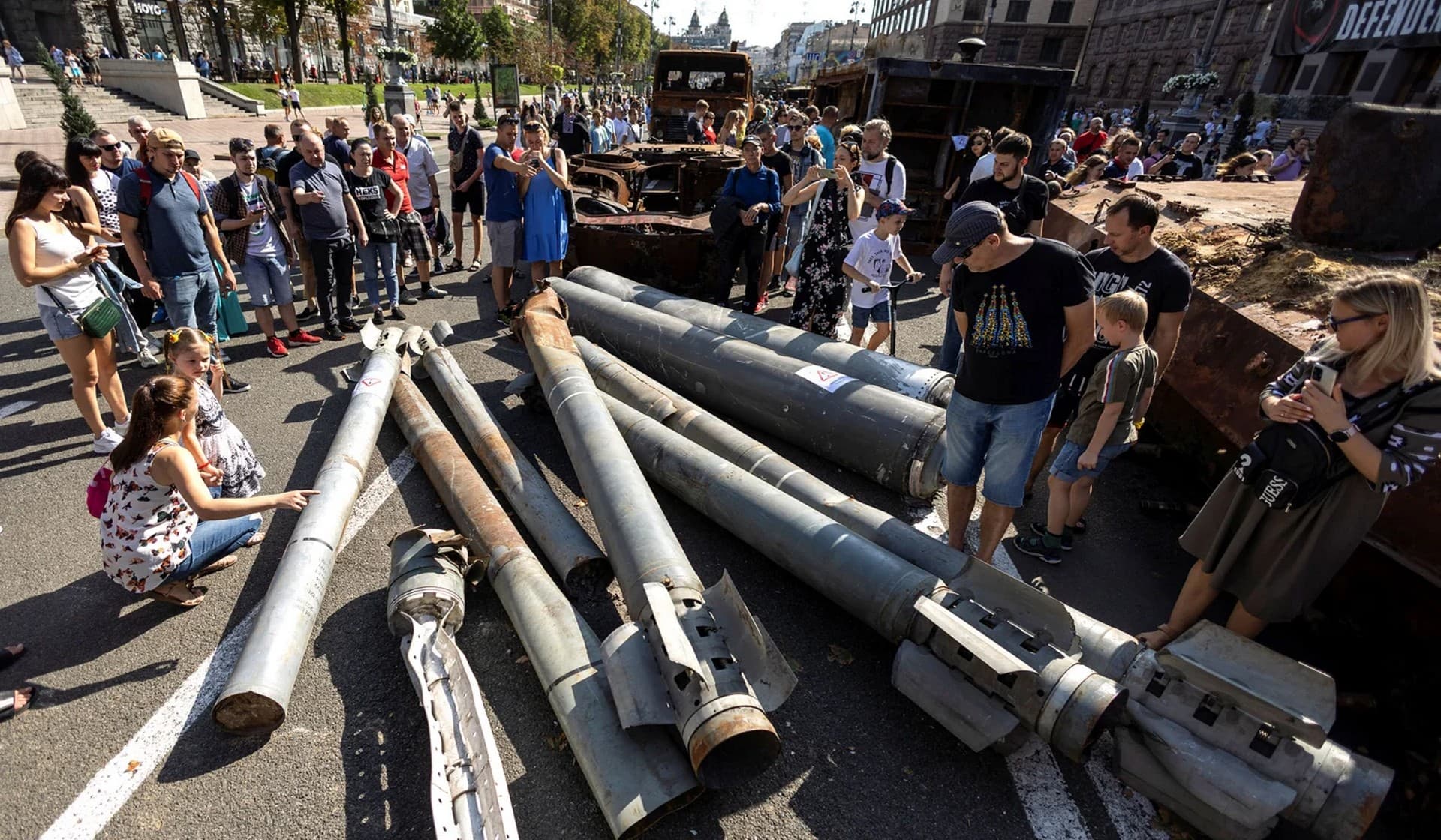 People visit an exhibition of destroyed Russian military vehicles and weapons in Kyiv