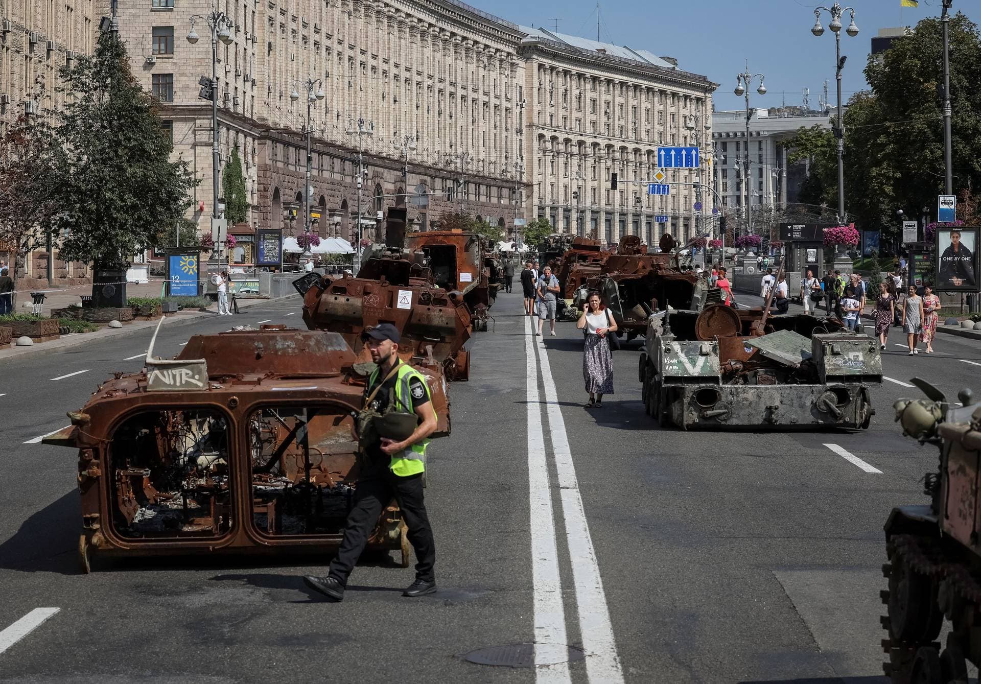 People attend an exhibition displaying destroyed Russian military vehicles in central Kyiv
