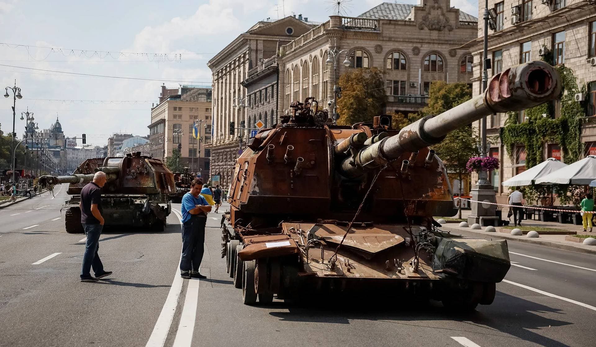 People attend an exhibition displaying destroyed Russian military vehicles in central Kyiv