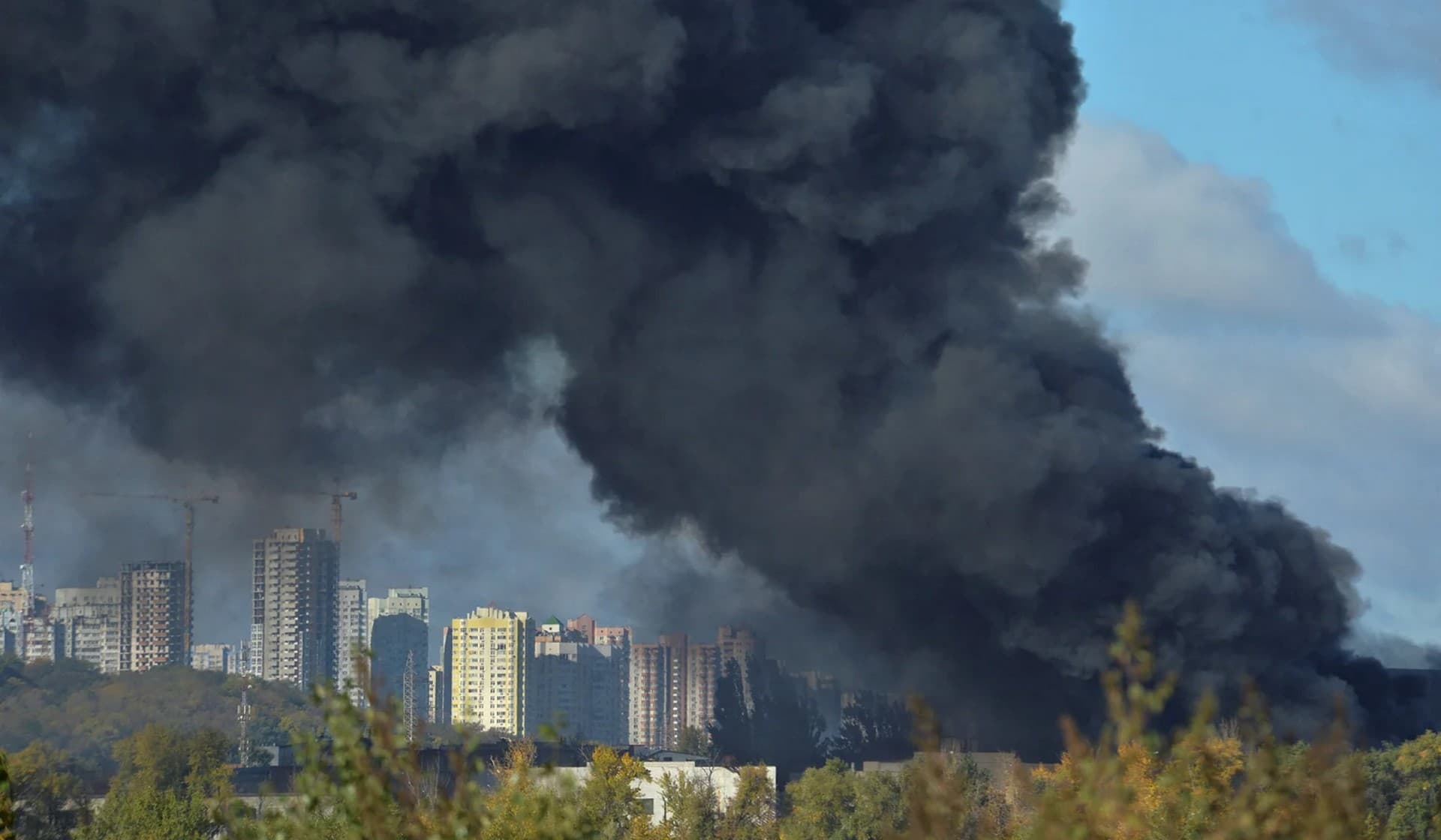 Smoke rises over the city after a Russian missile strike in Kyiv