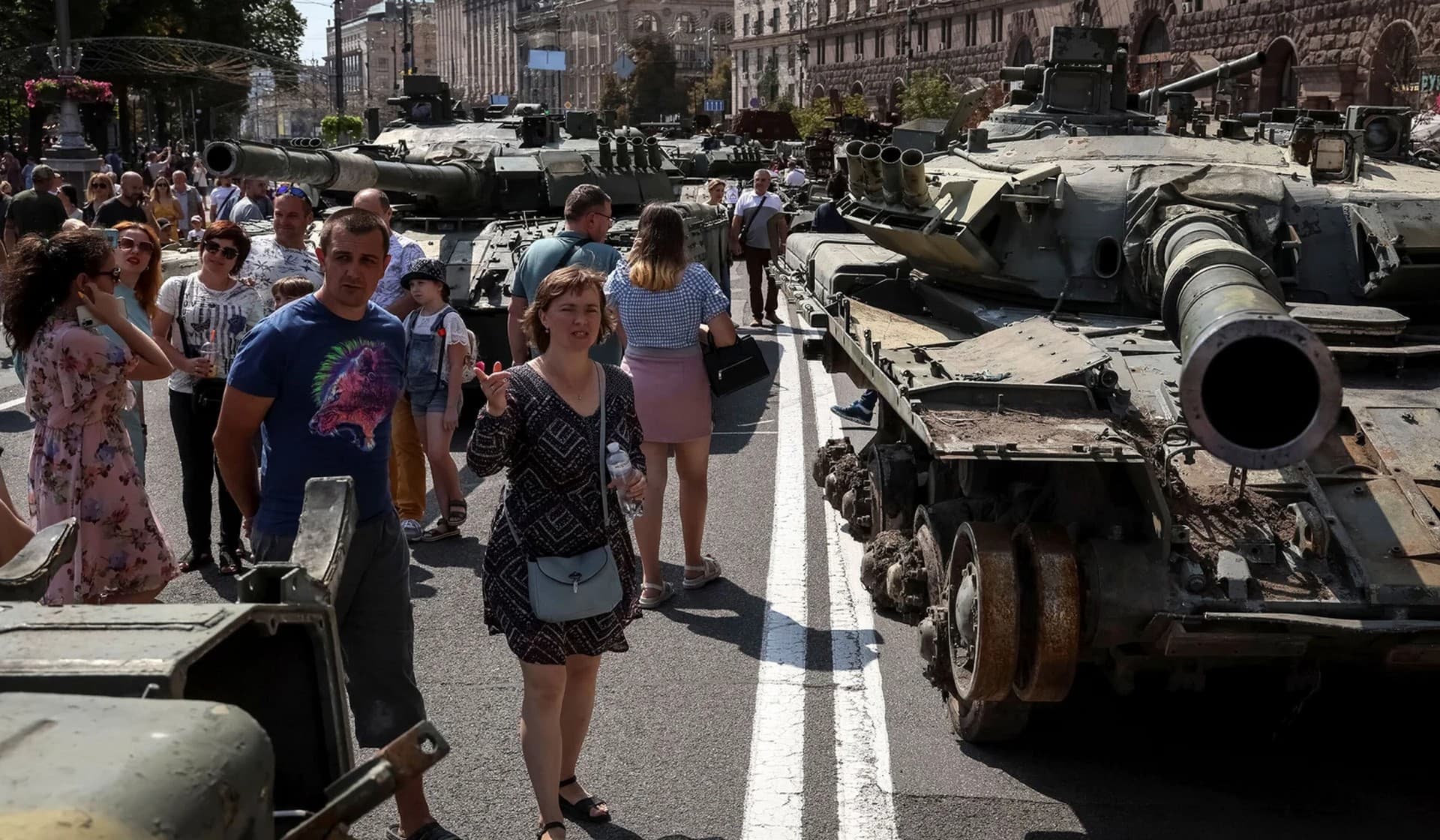 People attend an exhibition displaying destroyed Russian military vehicles in Kyiv