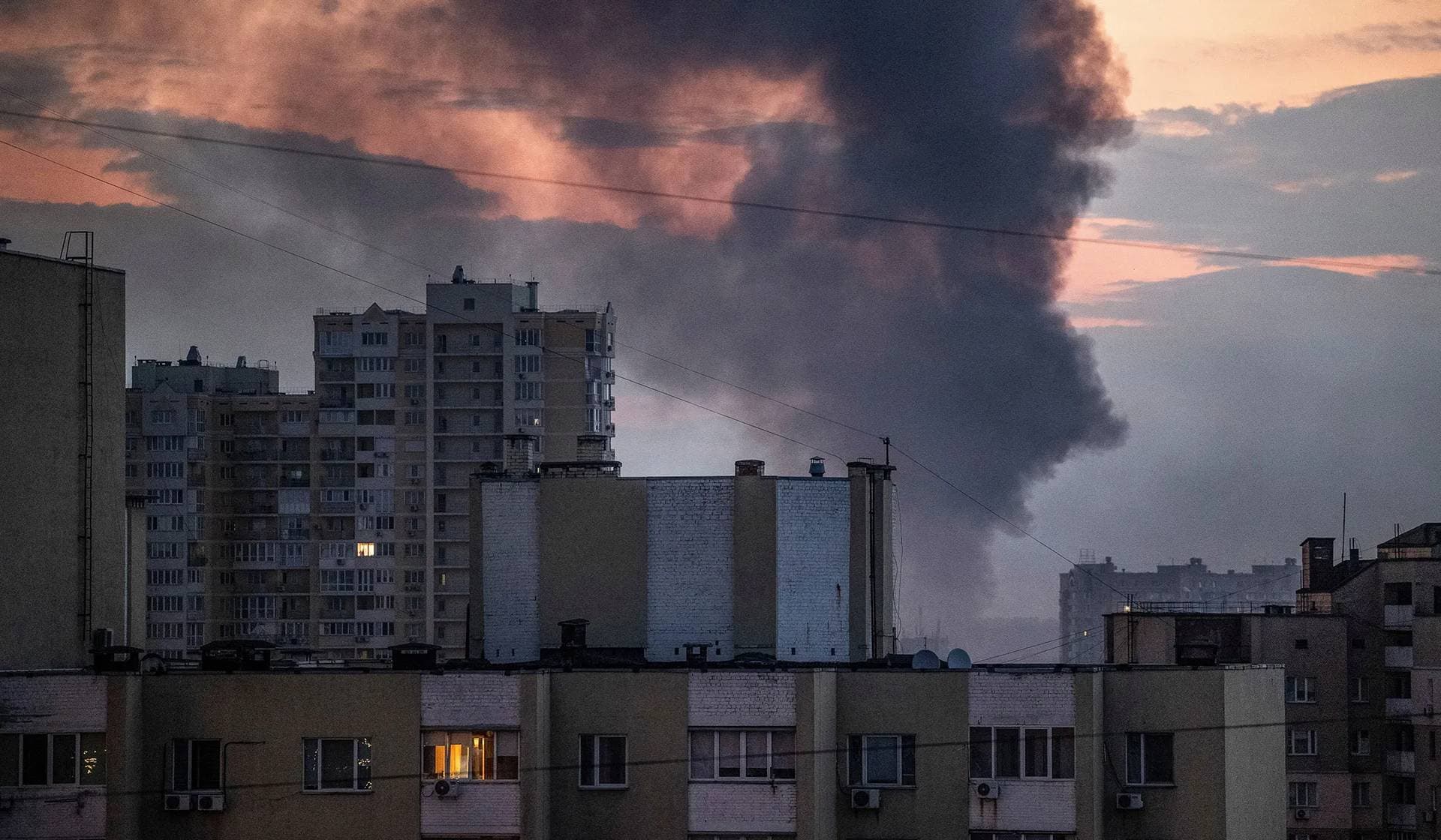 Smoke rises in the sky over the city after a Russian missile strike in Kyiv