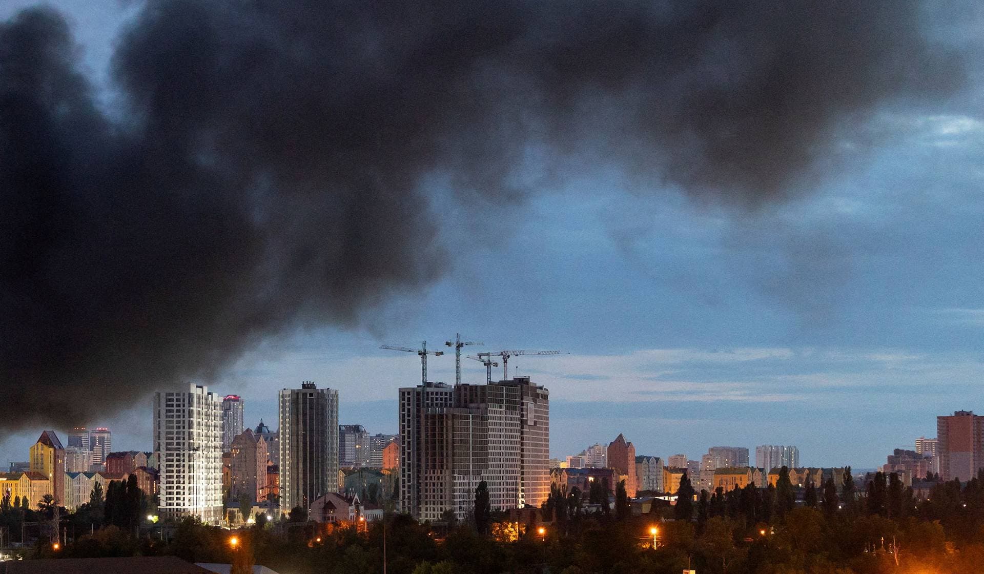 Smoke rises in the city during a Russian missile strike in Kyiv