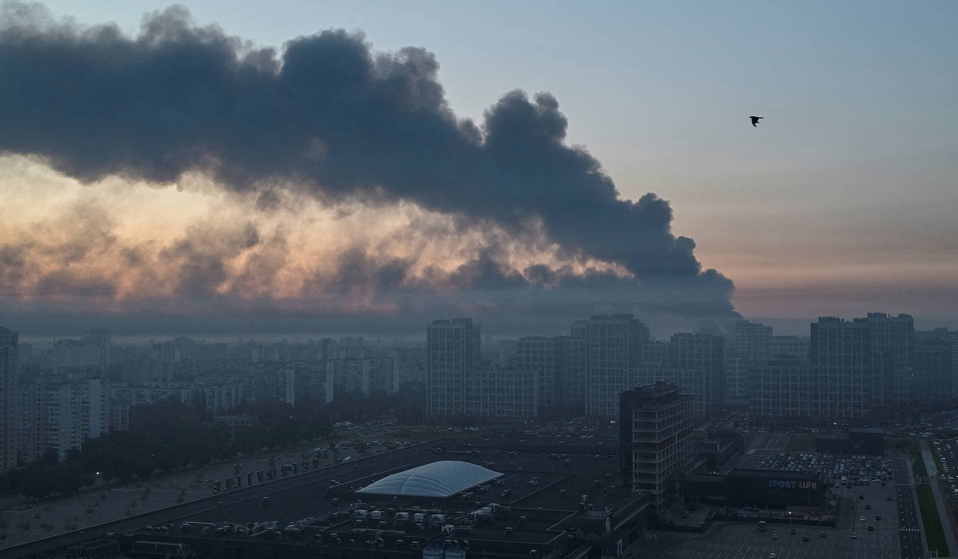 Smoke rises in the city after a Russian missile and drone strike in Kyiv