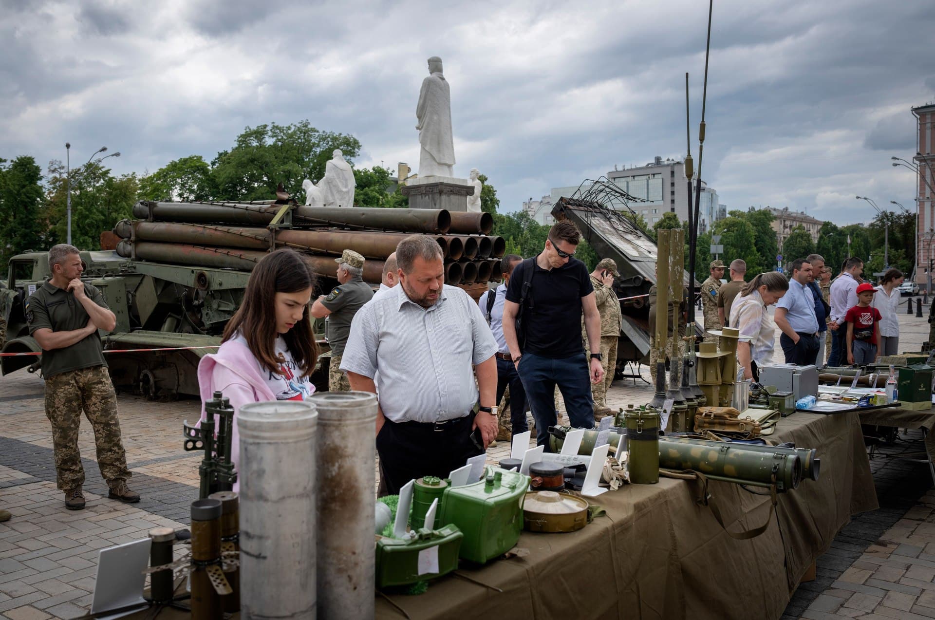 People look at Russian ammunition installed as a symbol of war in central Kyiv
