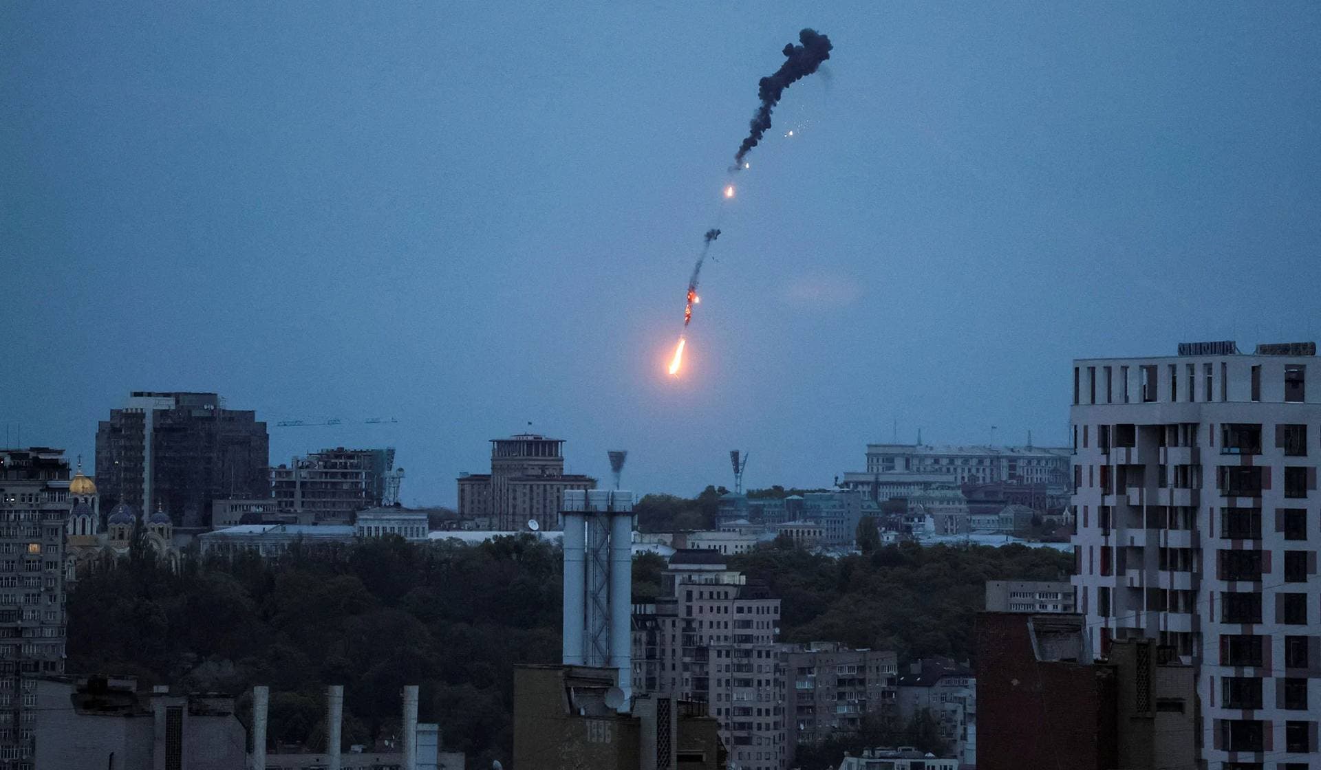 An explosion of a drone in the sky over the city during a Russian drone strike in Kyiv