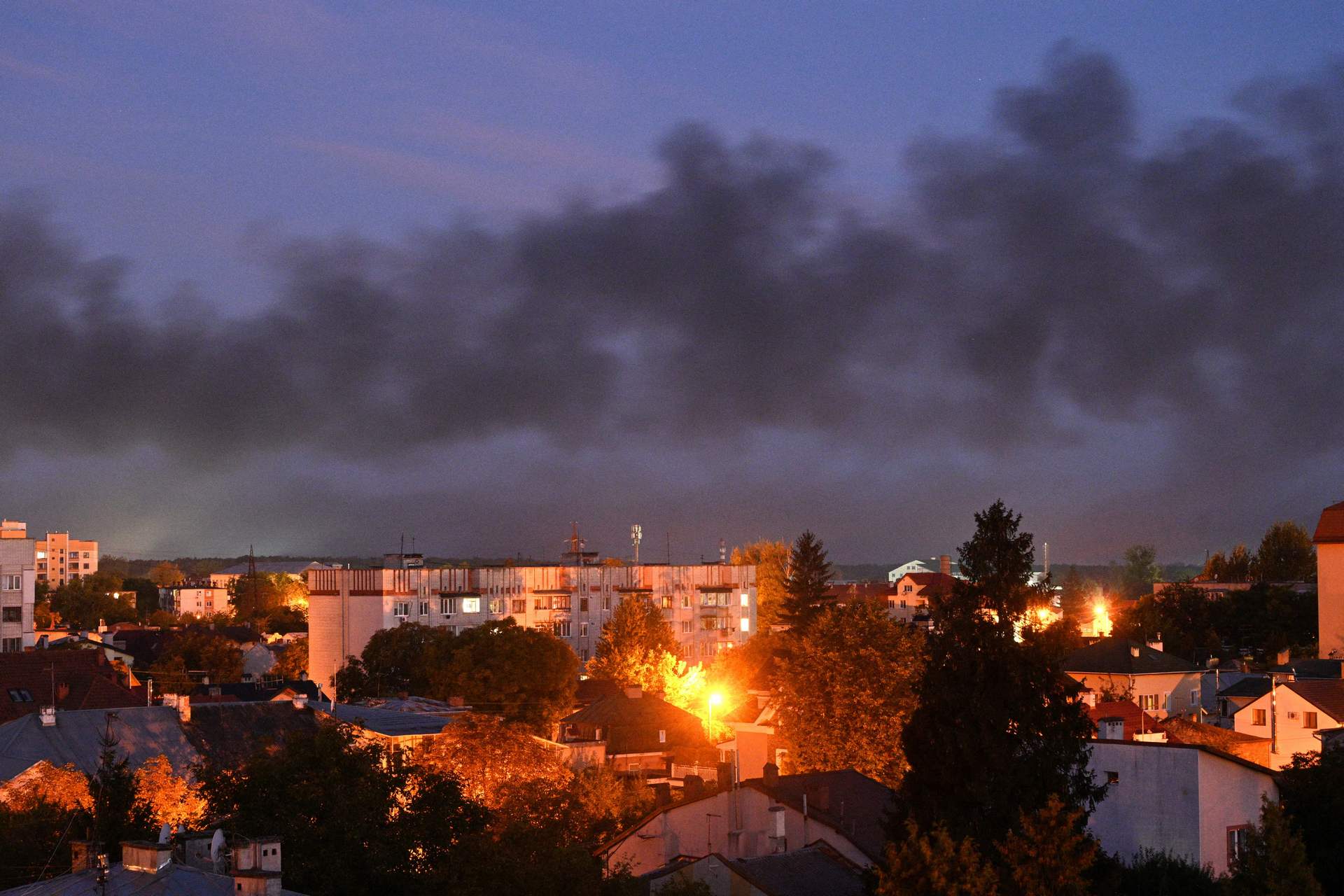 Black smoke billows over the city after drone strikes in the western Ukrainian city of Lviv