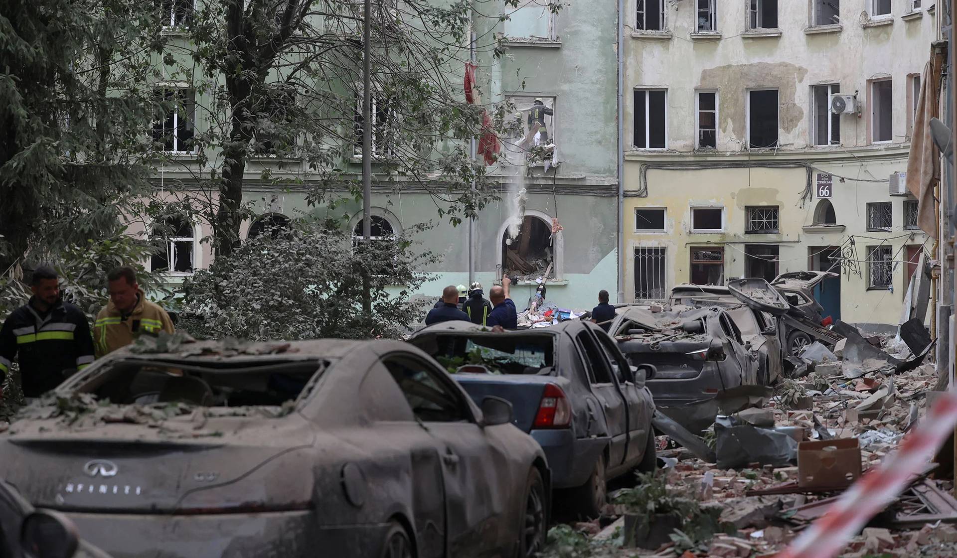 Rescuers at the site of a residential building hit by a Russian missile strike in Lviv