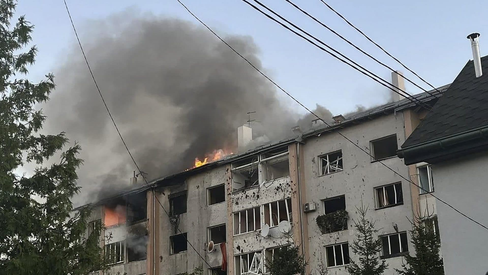 Flames rise from a building in Lviv hit by a Russian rocket attack