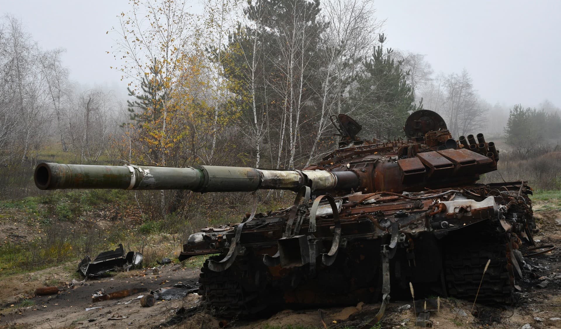 A destroyed Russian tank is seen near the recently recaptured village of Yampil