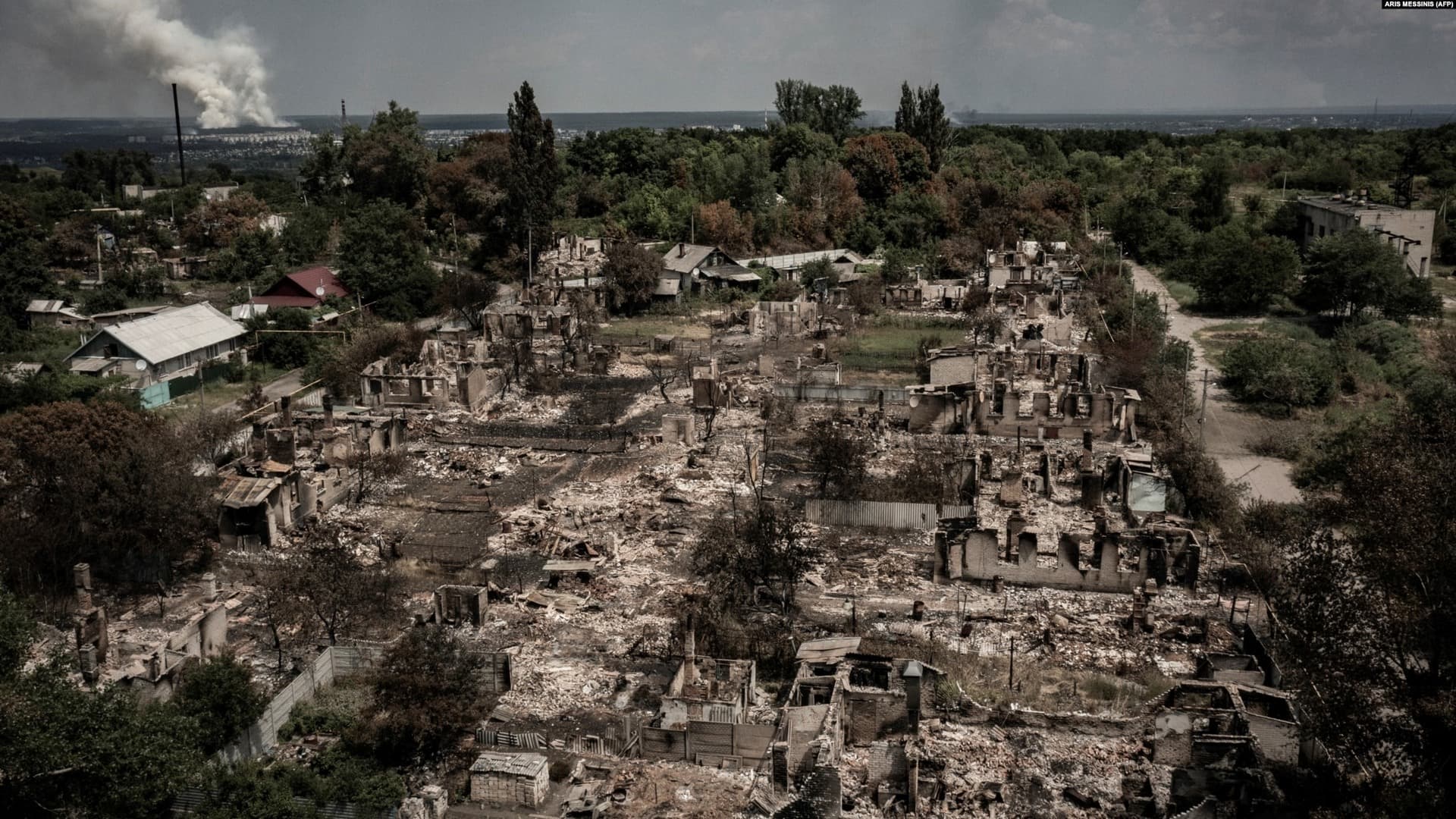 An aerial view shows destroyed houses after a Russian strike in the town of Pryvillya