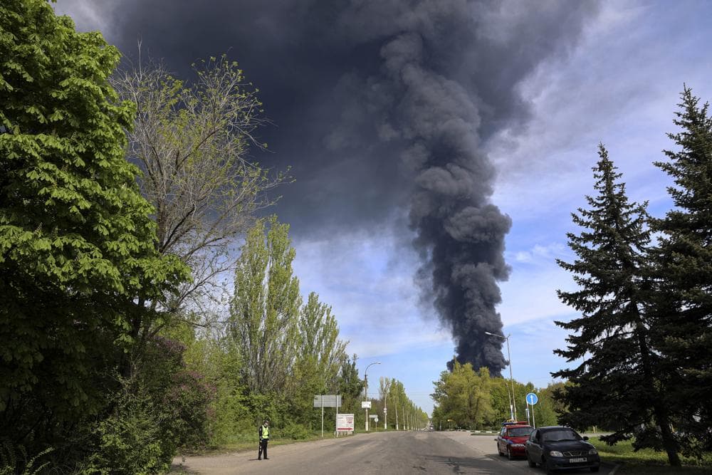 Smoke rises from the oil depot as fire broke out after missiles struck the facility in Makiivka