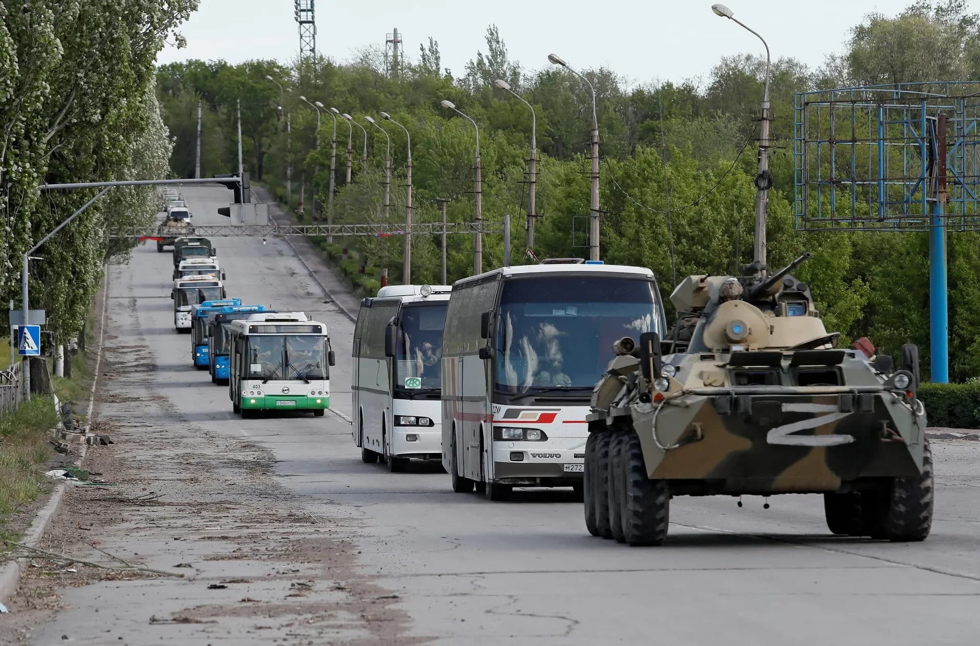 Buses carrying Ukrainian service members who surrendered at the Azovstal steel plant in Mariupol