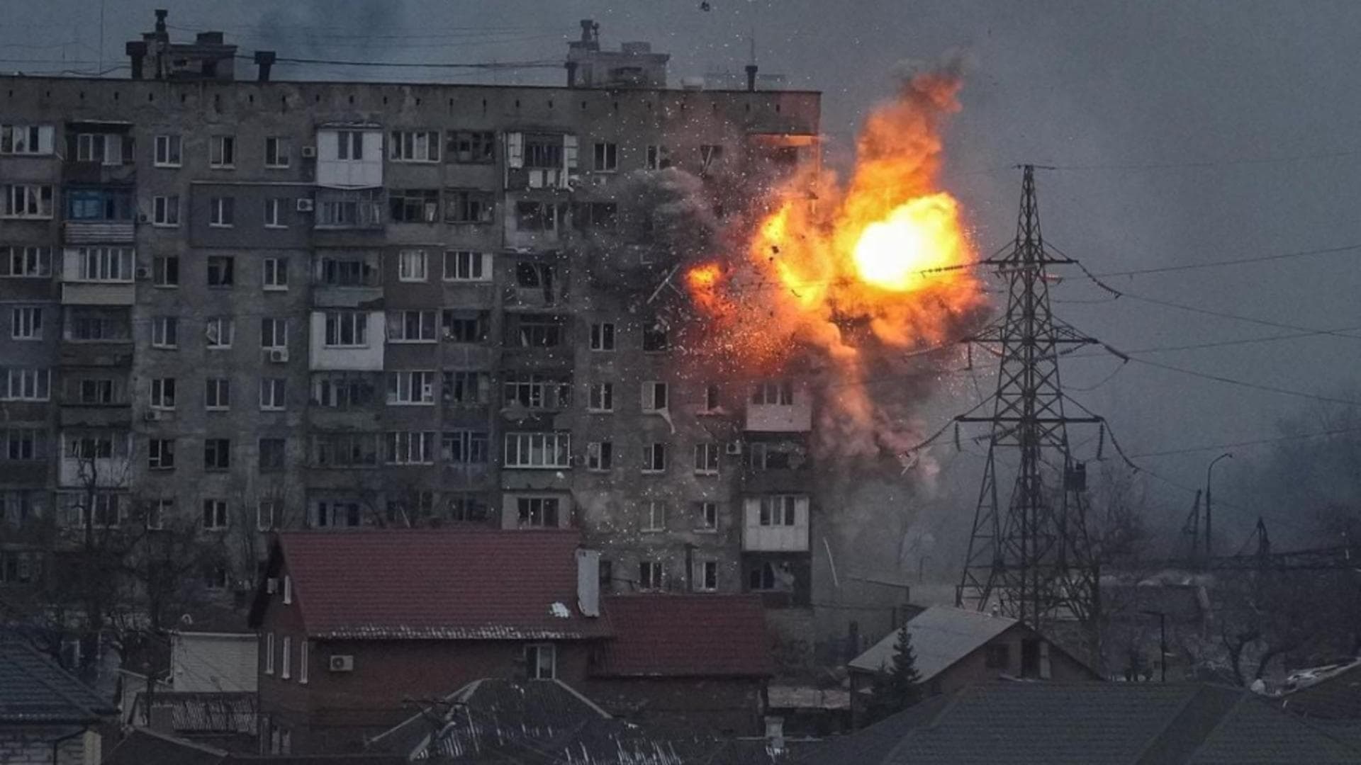 Russian forces fire at an apartment building in Mariupol