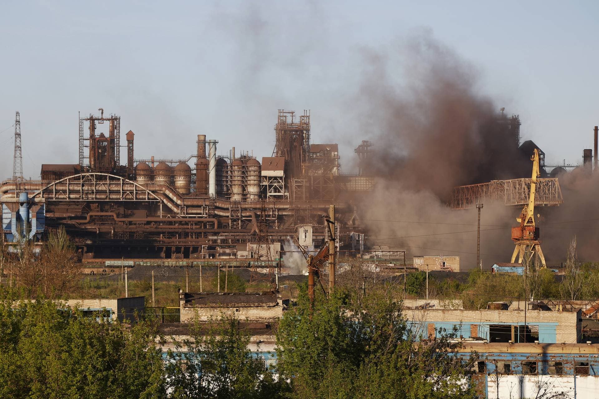 Smoke rises from the Metallurgical Combine Azovstal in Mariupol during shelling, in Mariupol