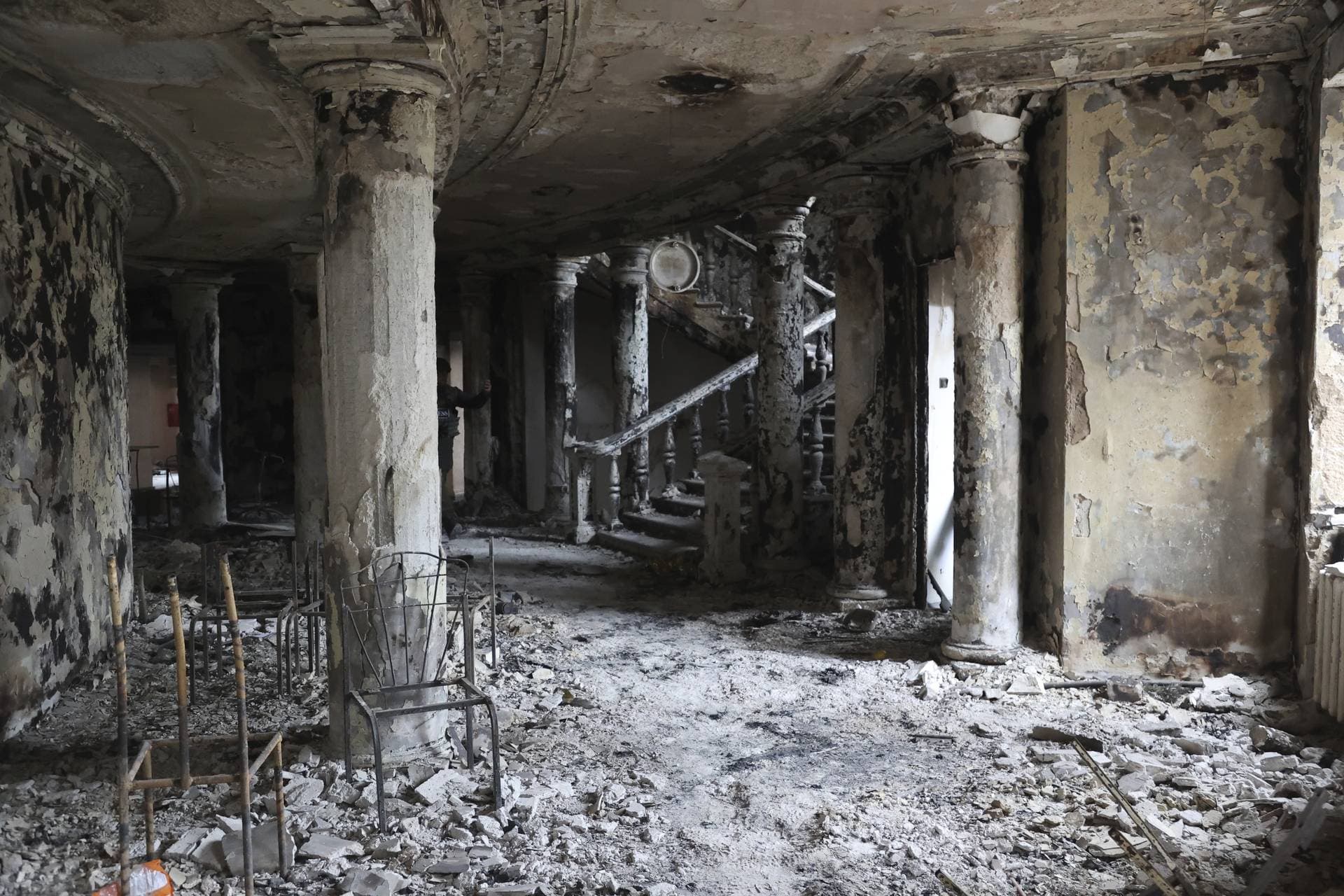 Debris covers the inside of the Donetsk Academic Regional Drama Theatre following a March 16, 2022, bombing in Mariupol