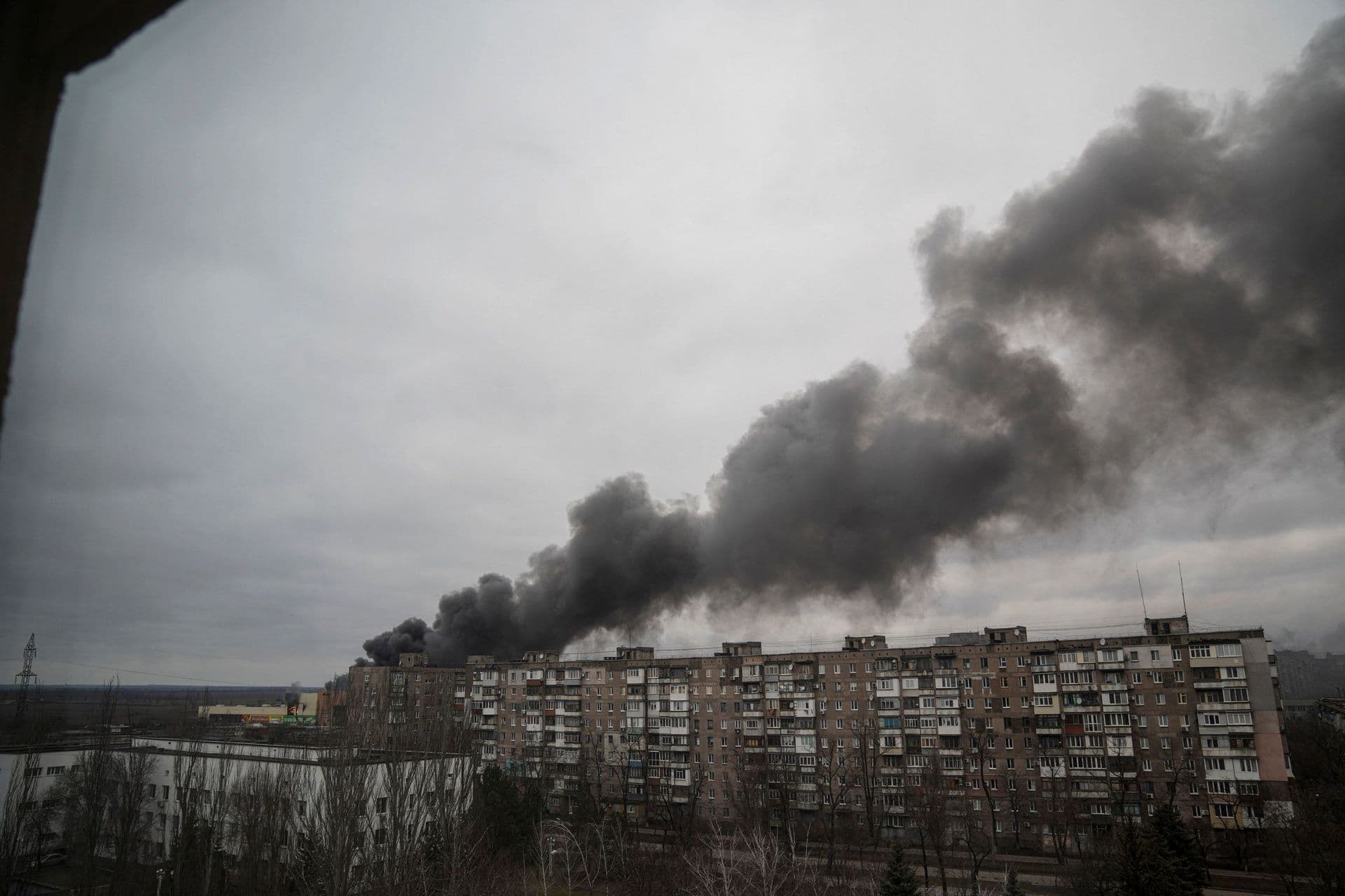 Smoke rises after shelling by Russian forces in Mariupol