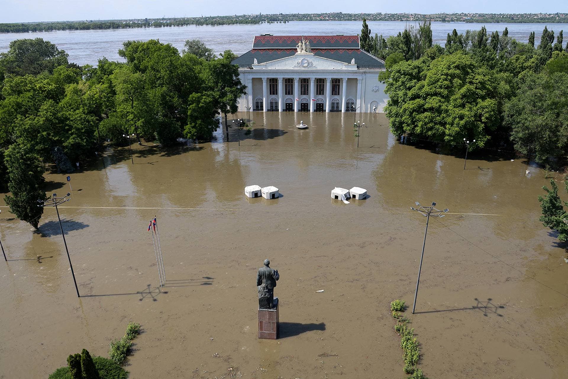 The House of Culture on a flooded street in Nova Kakhovka
