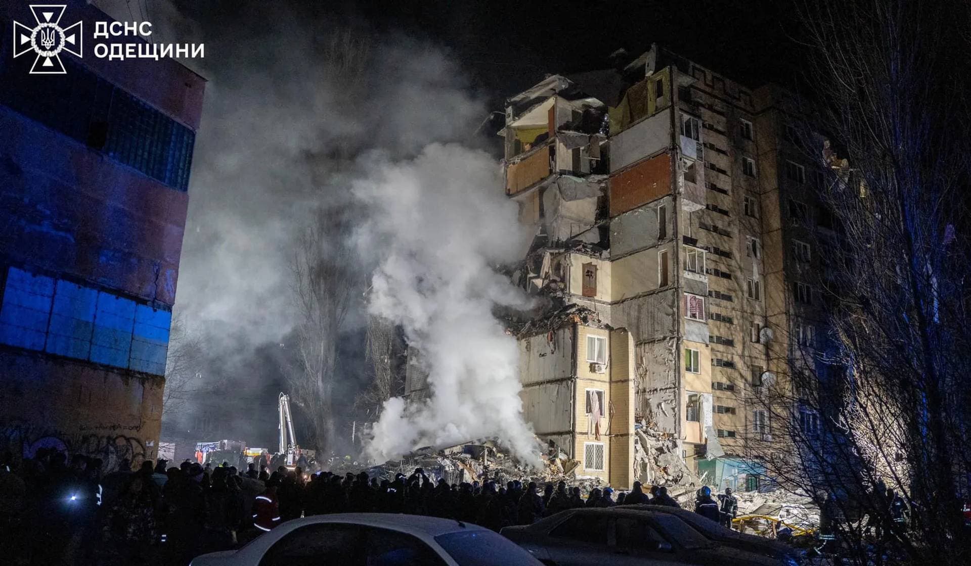 Smoke rises from an apartment building heavily damaged by a Russian drone strike in Odesa