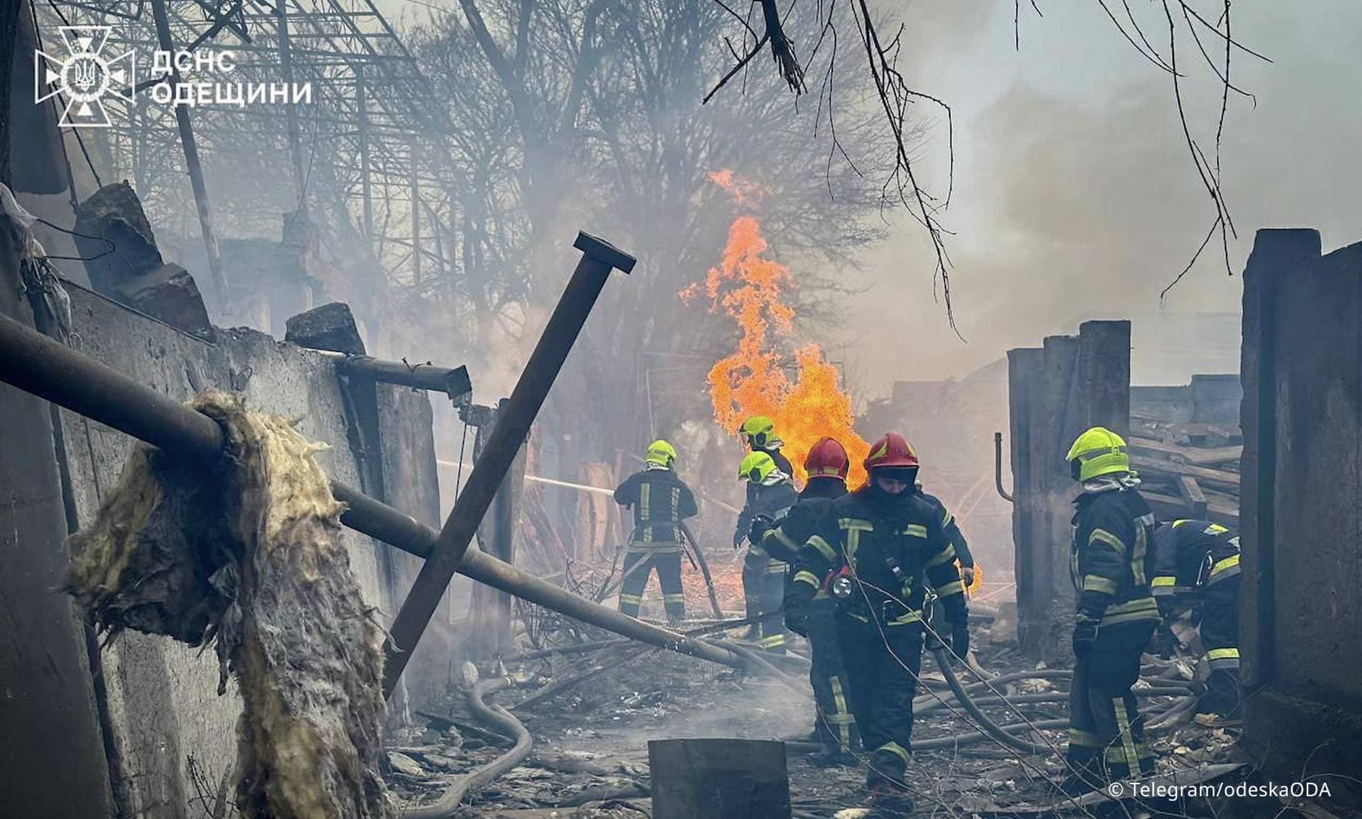 Firefighters work at the site of a Russian missile strike in Odesa